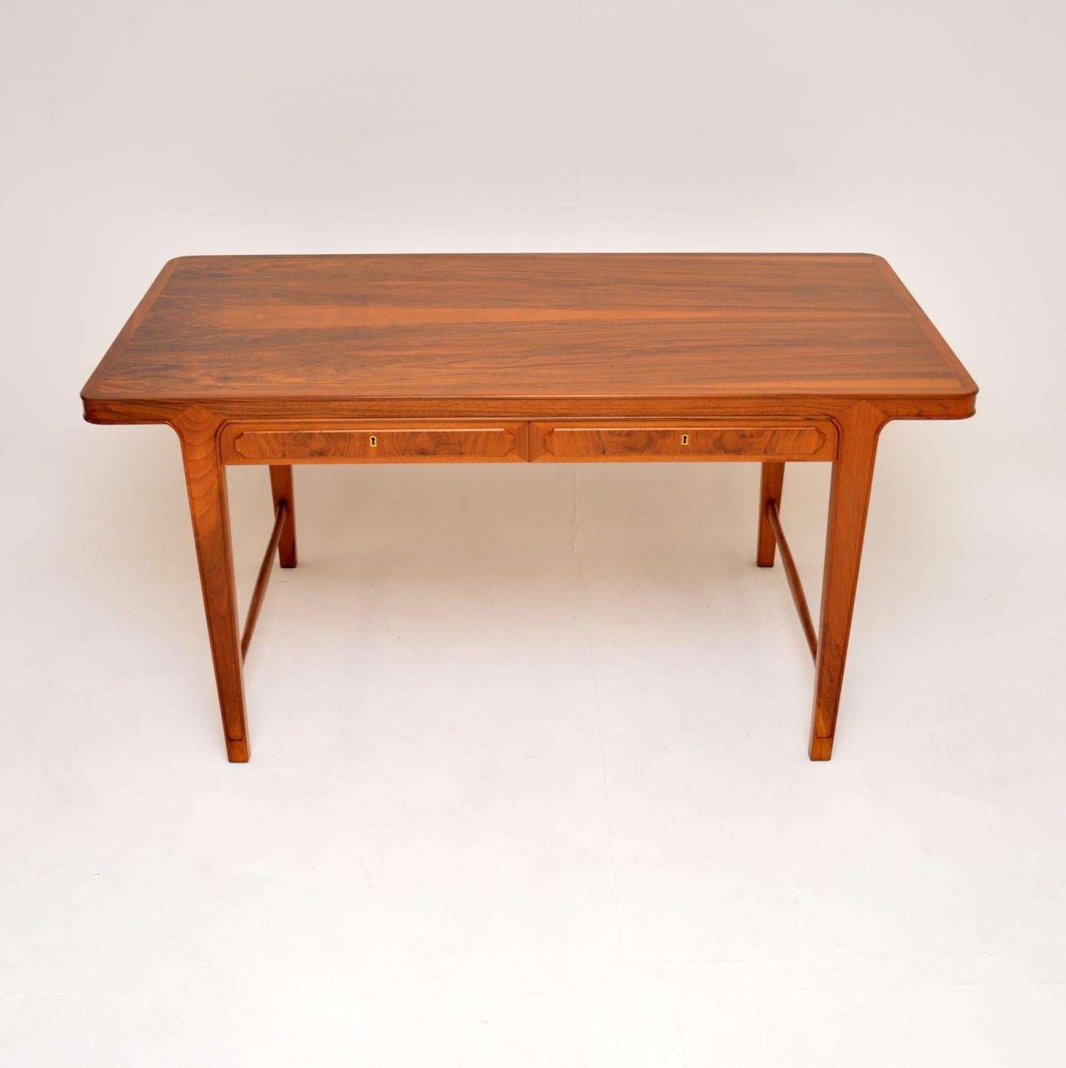 A stunning and extremely well made large 1960’s vintage walnut desk, which was recently imported from Sweden.

The quality is exceptional, this is beautifully constructed and its a great size. It’s made from walnut which has a gorgeous colour tone