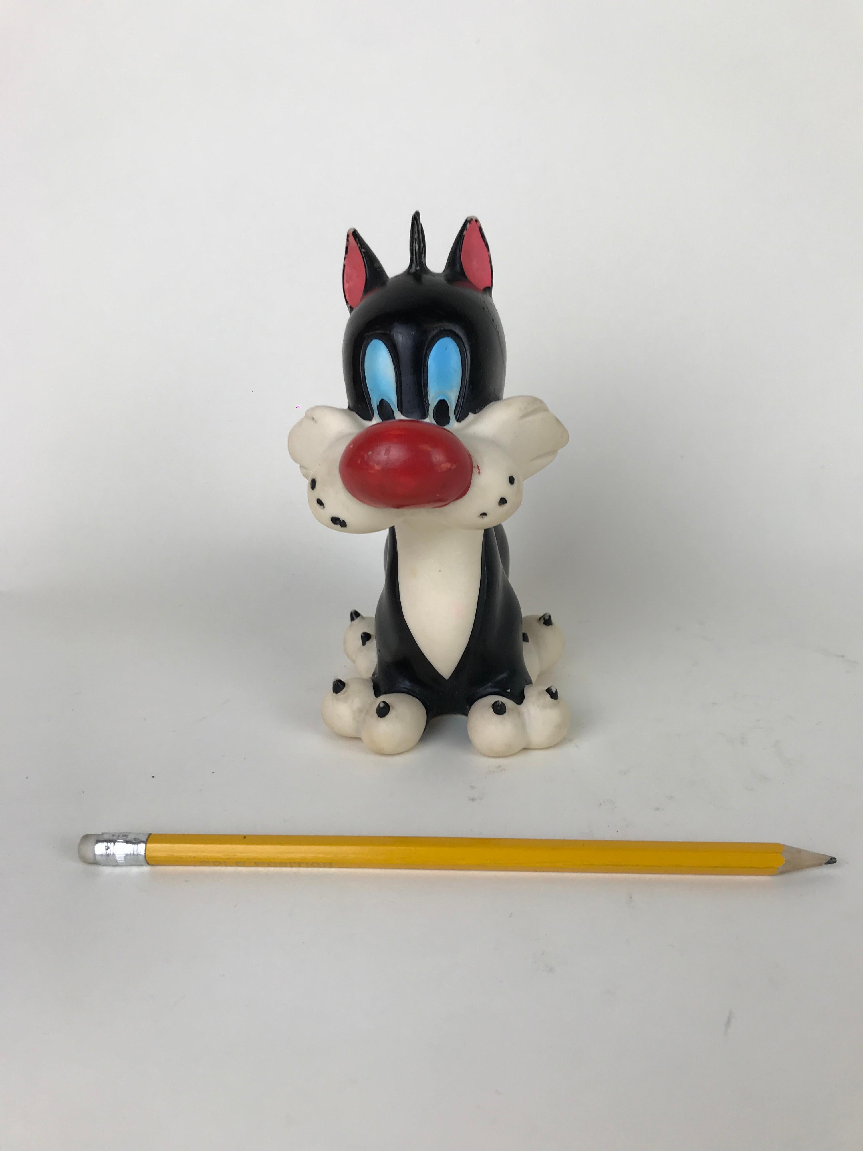 Vintage Sylvester junior rubber squeak toy made for Warner Bros. by Italian toy maker Rubbertoys in the 1960s.

The back of Sylvester junior is marked Rubbertoys made in Italy with the company swan symbol and Warner Bros. 

Collector's