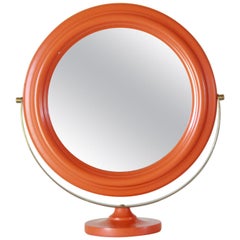 Miroir de table italien vintage avec cadre en bois orange et laiton.