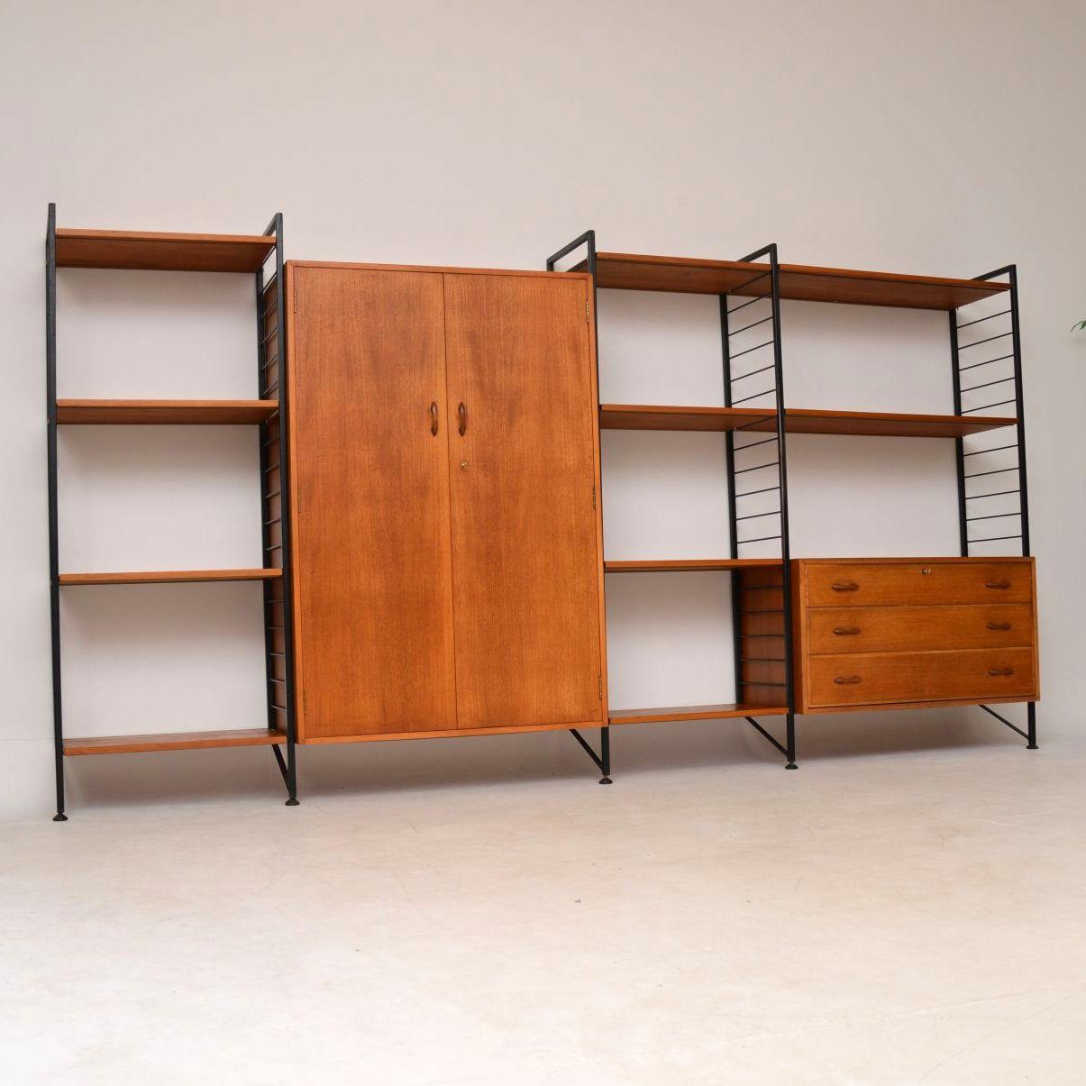 A stylish and very impressive ladderax wall unit, this is ideal for the bedroom and is quite a sizeable piece. It consists of a wardrobe, chest of drawers, shelves and five ladder rails. The condition is great throughout, it’s all very clean, sturdy