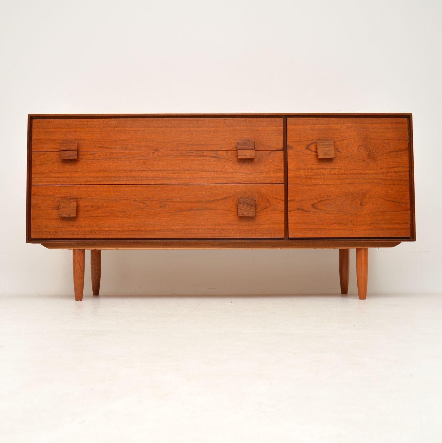 A stunning and very rare vintage teak sideboard, this was designed by the famous Danish designer IB Kofod Larsen for the G- Plan Danish range, it dates from the 1960s. It is a very useful size and is in superb condition, we have had this stripped