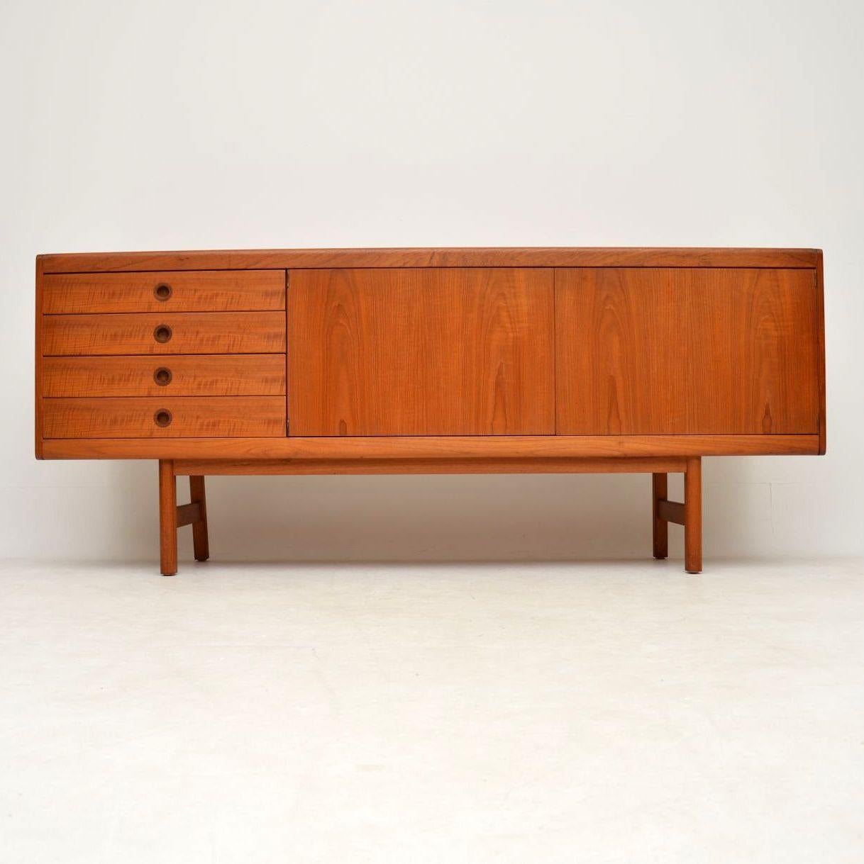 A stunning vintage teak sideboard designed by Robert Heritage, this was made by Archie Shine in the 1960s. It’s of superb quality, and this is very practical size, low and long, but not too long. The condition is excellent for its age, with only