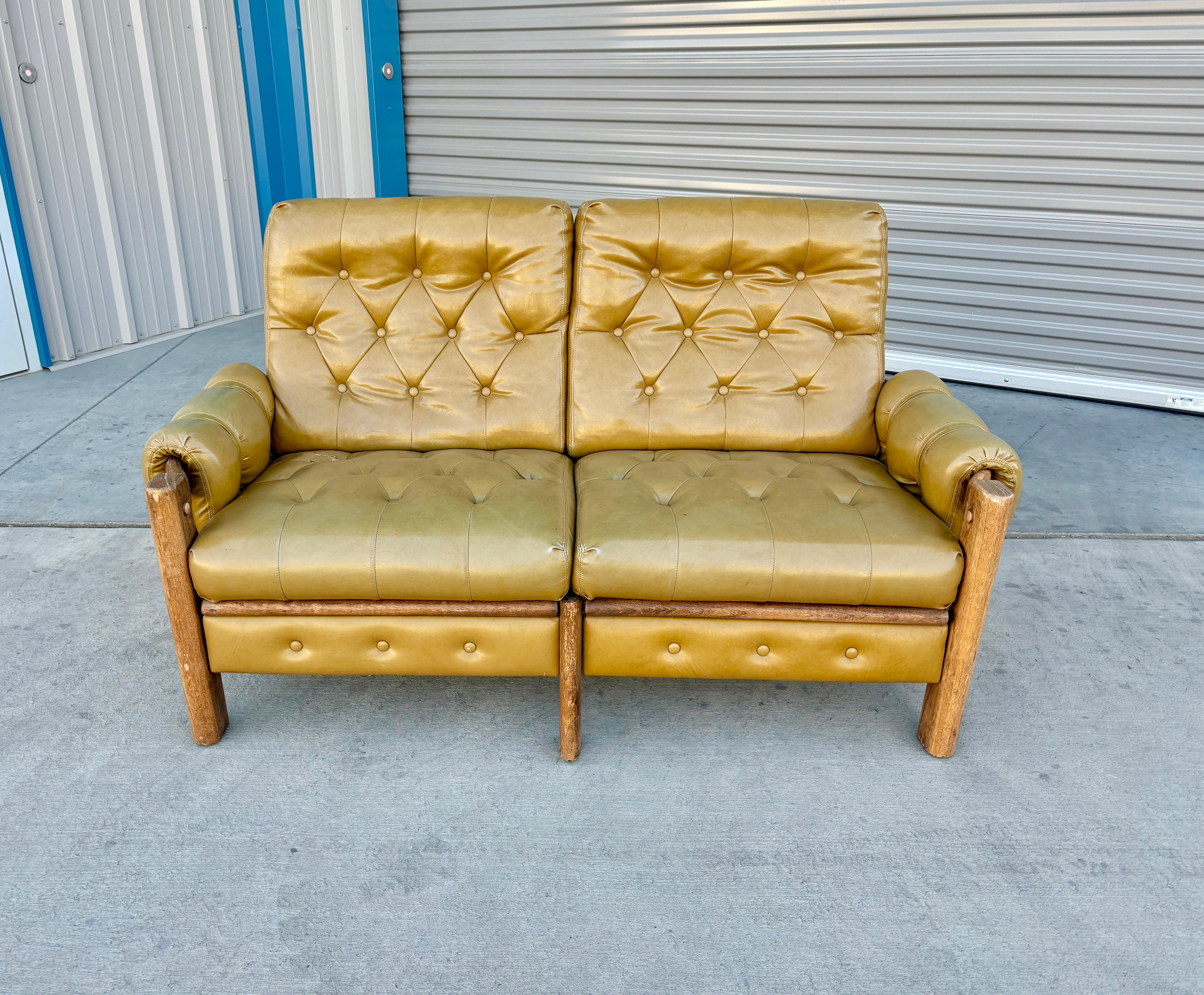 Mid-Century Modern 1960s Vintage Tufted Vinyl & Oak Loveseat For Sale