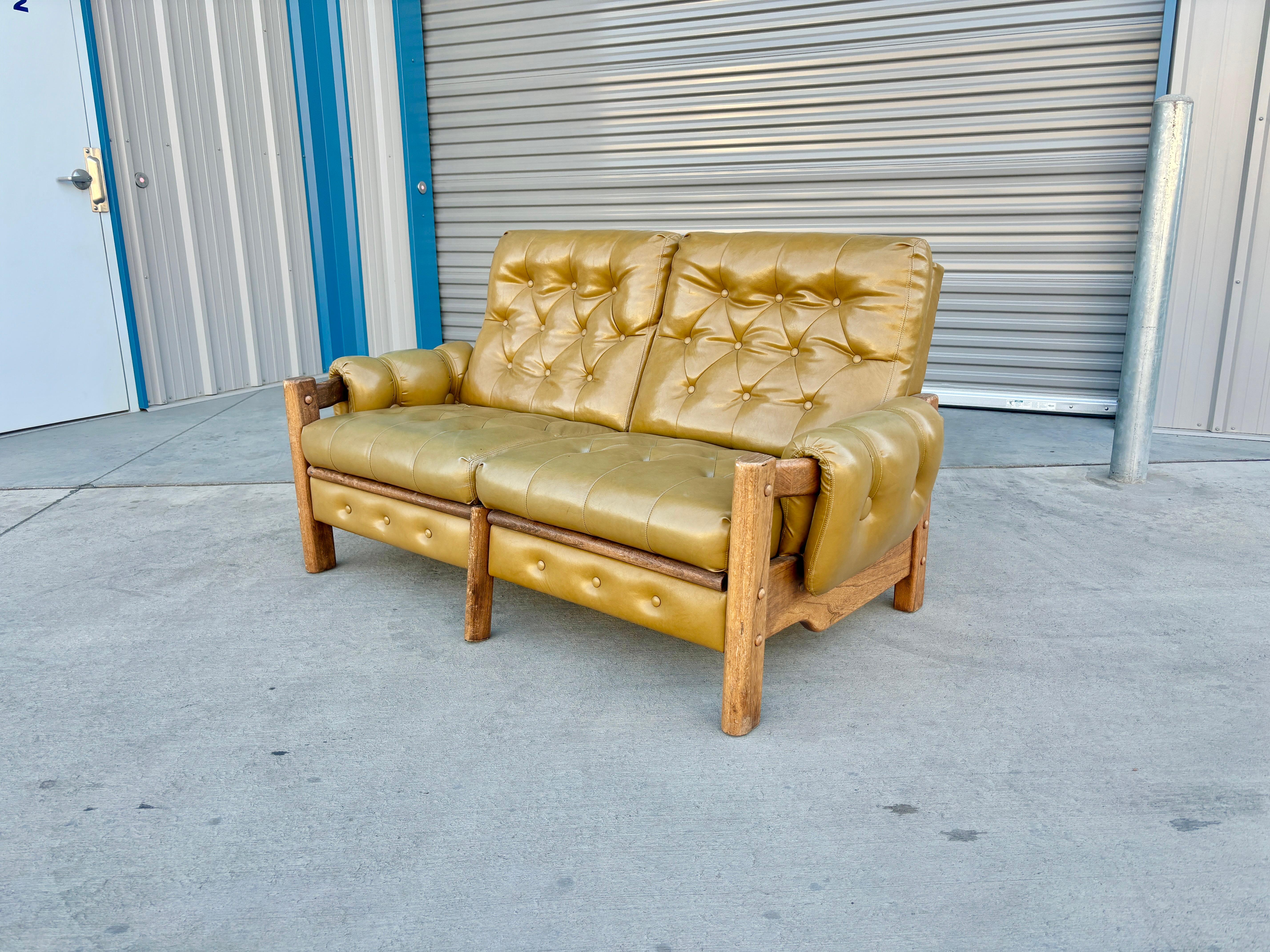 American 1960s Vintage Tufted Vinyl & Oak Loveseat For Sale