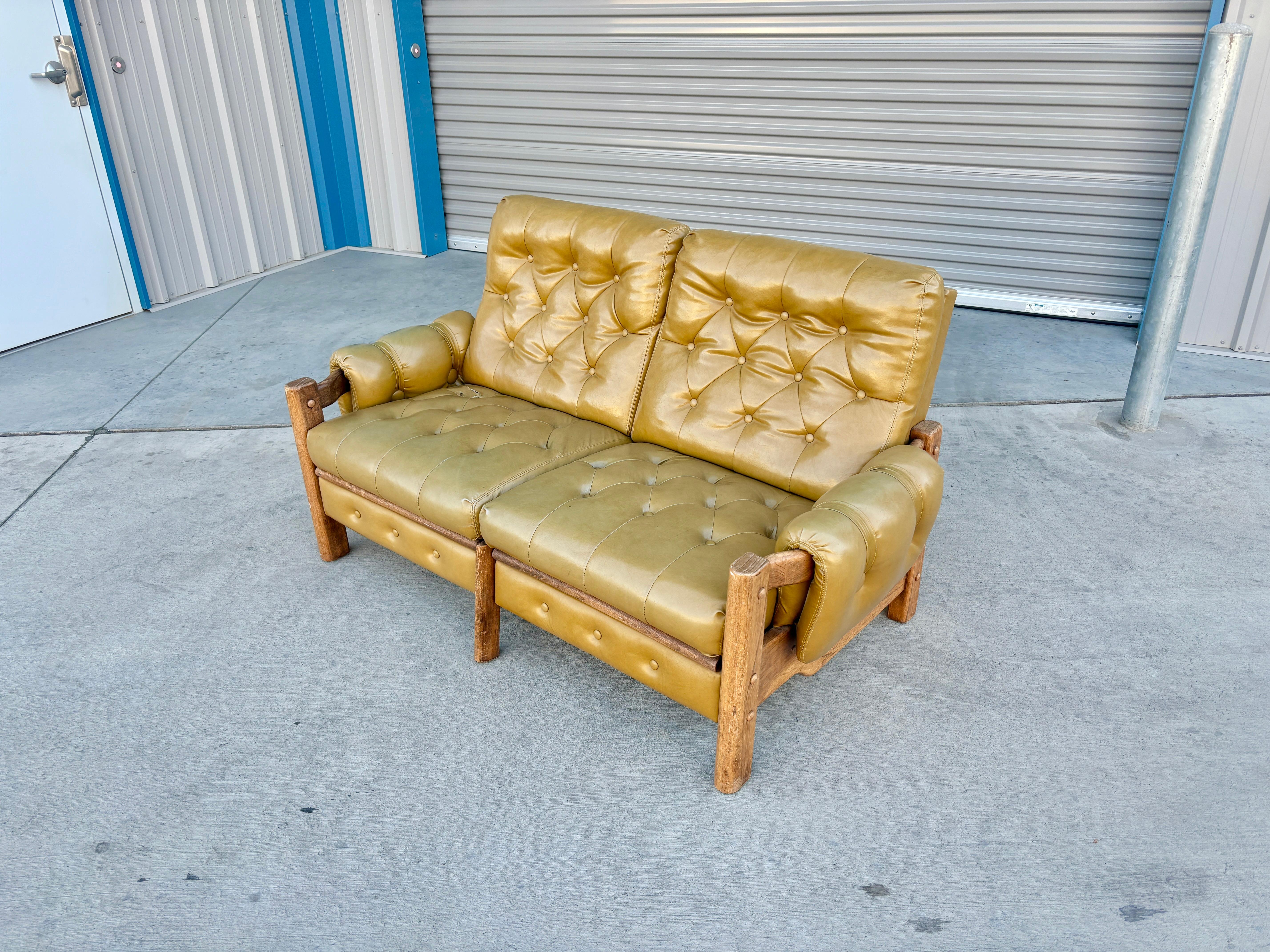 1960s Vintage Tufted Vinyl & Oak Loveseat In Good Condition For Sale In North Hollywood, CA