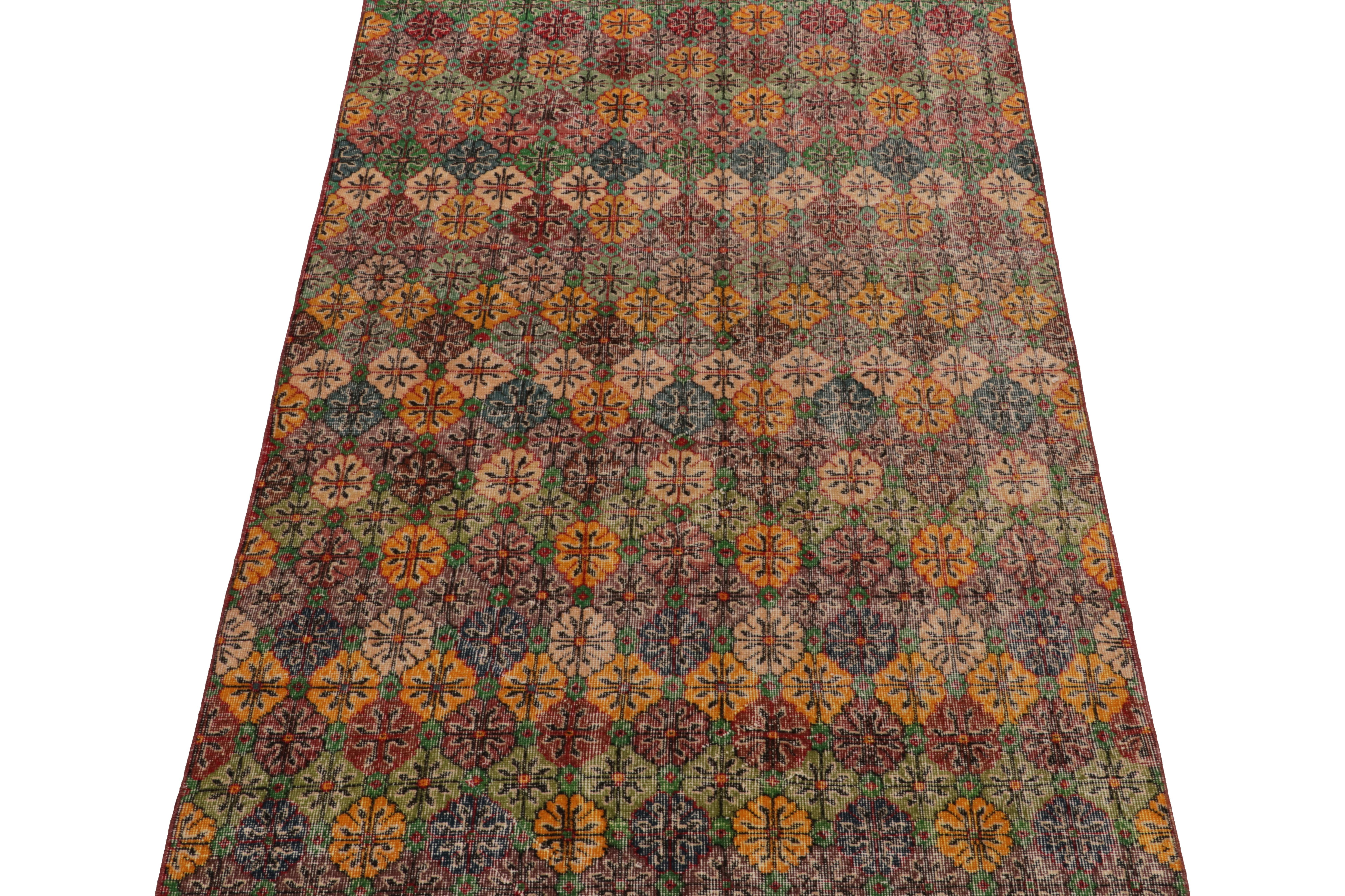 Hand-knotted in wool, a 5x8 vintage rug from an acclaimed Turkish designer entering Rug & Kilim’s commemorative Mid-Century Pasha Collection. This dedicated piece enjoys an art deco style with a fabulously unique colorway for this geometric pattern