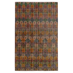 Türkischer Vintage-Teppich aus den 1960er Jahren mit geometrischem Muster in Grün & Orange von Teppich & Kelim