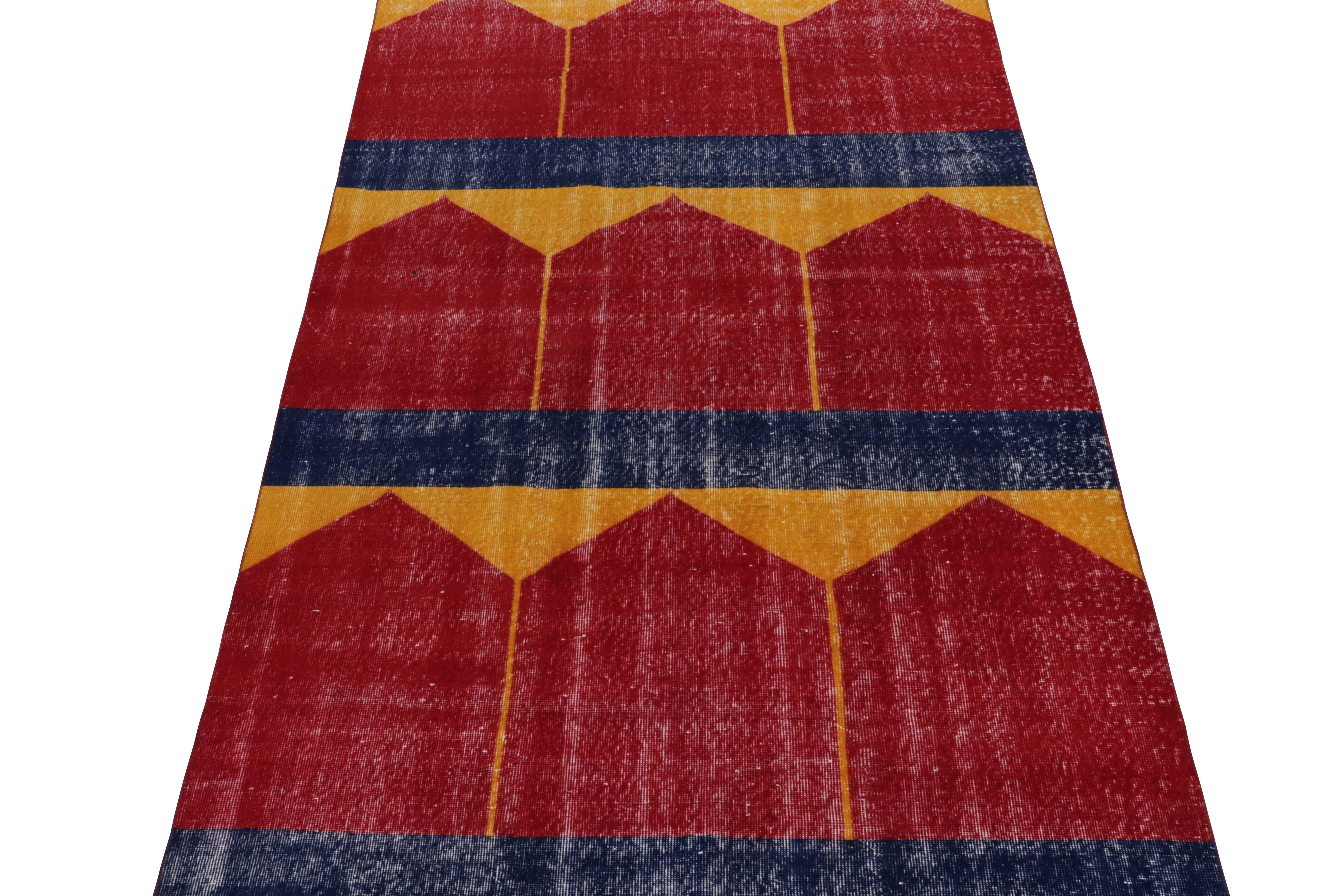 Hand-knotted in wool, a 6x10 vintage rug from a revered Turkish atelier, entering Rug & Kilim’s commemorative Mid-Century Pasha Collection.

This dedicated piece enjoys mid-century aesthetics with geometric patterns in deep red, blue, and gold—all