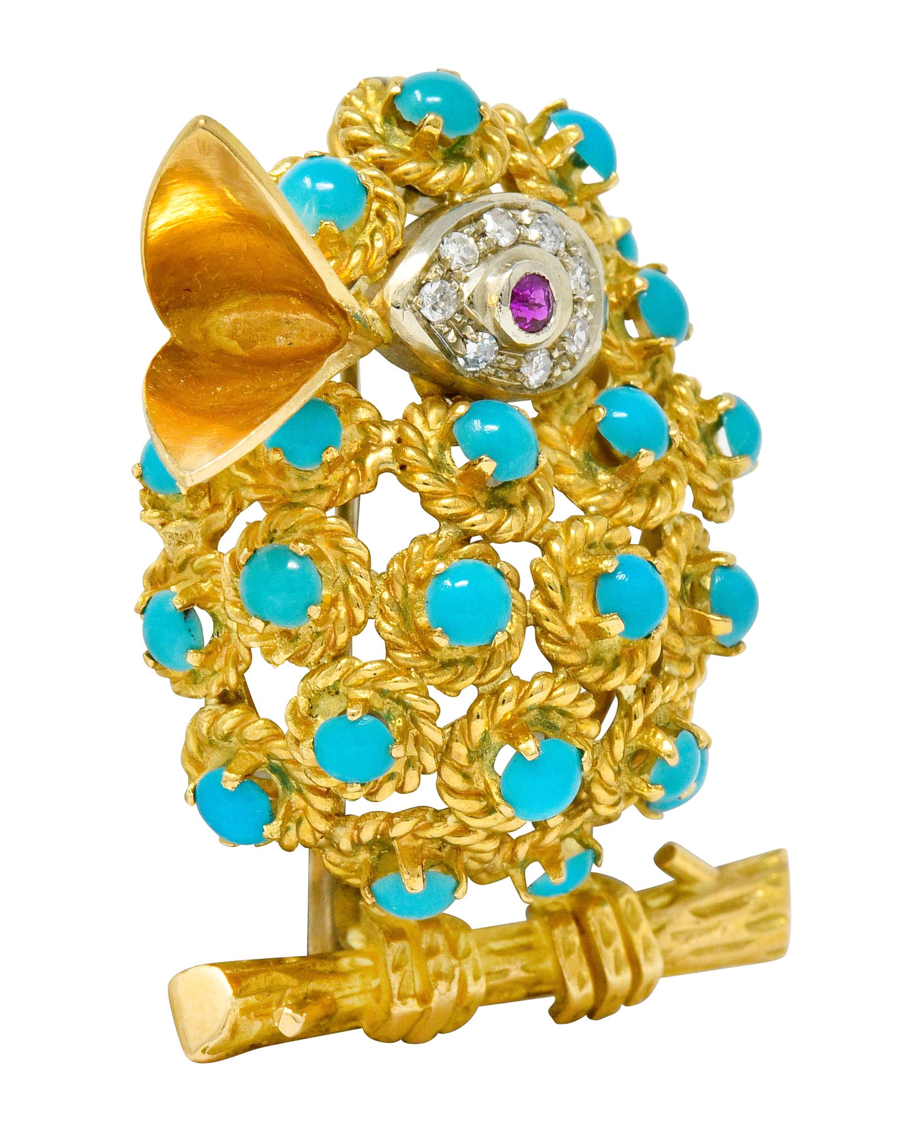 Brooch is designed as a songbird perched on a branch with a polished gold beak open in song

Body is comprised of circles of twisted rope motif, each centering a prong set 2.5 mm round turquoise cabochon

Eye is a round cut ruby weighing