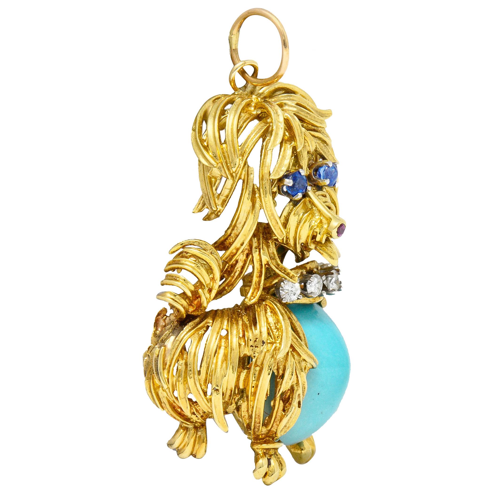 Pendant is whimsically designed as a shaggy Maltese dog with stylized gold tendrils throughout

Centering a turquoise cabochon stomach measuring approximately 14.0 x 12.0 mm

Highly domed, opaque, and robin's egg blue in color with minimal front