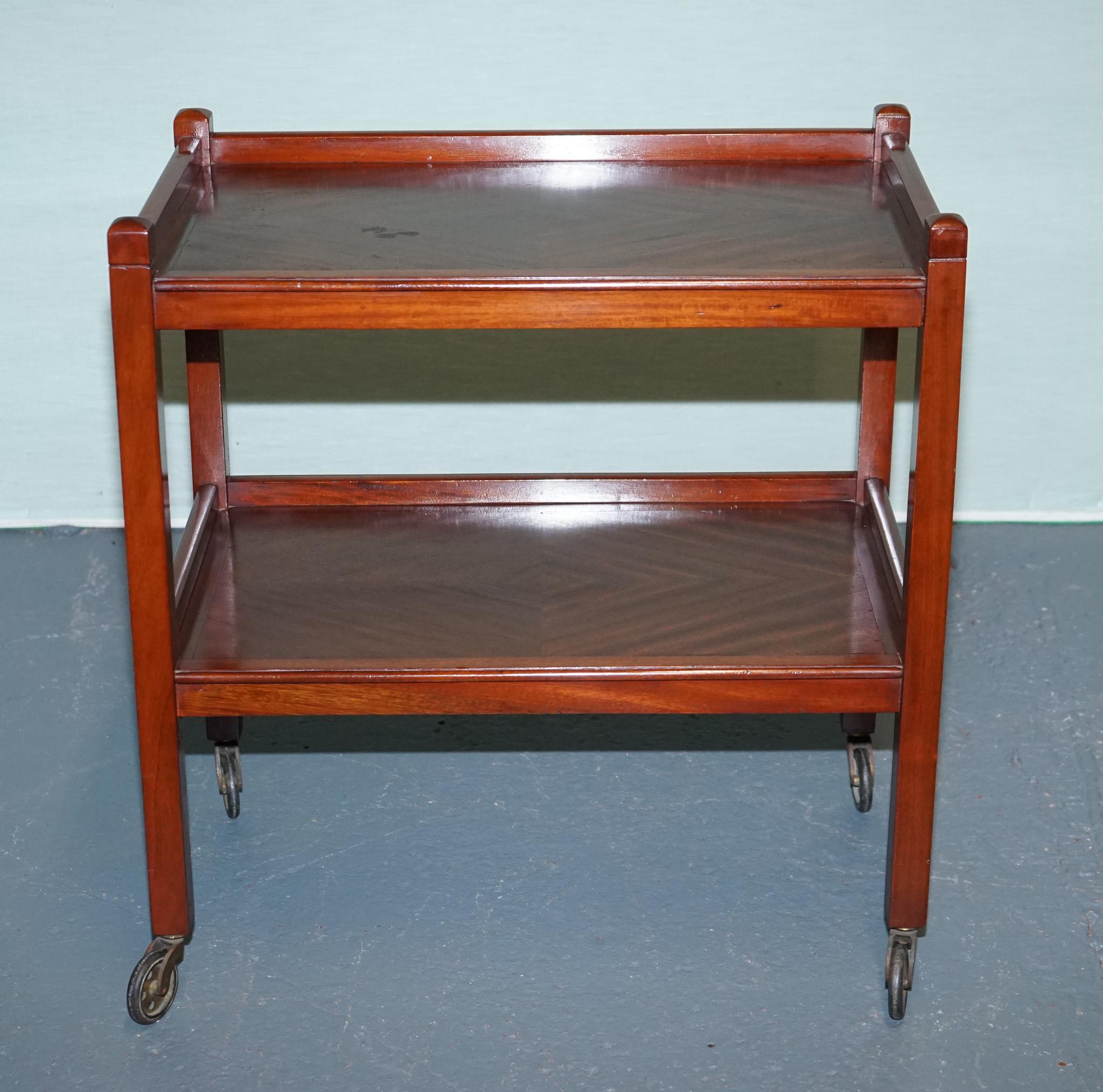 British 1960s VINTAGE TWO TIER WOODEN TEA TROLLET ON BRASS CASTERS For Sale
