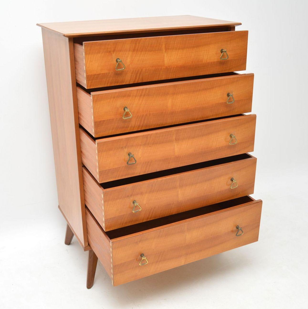 A beautifully made, quite large and very practical vintage chest of drawers in Walnut by the high end manufacturer Alfred Cox, this dates from the 1960s. The quality is superb and its in lovely original condition; this is clean, sturdy and sound