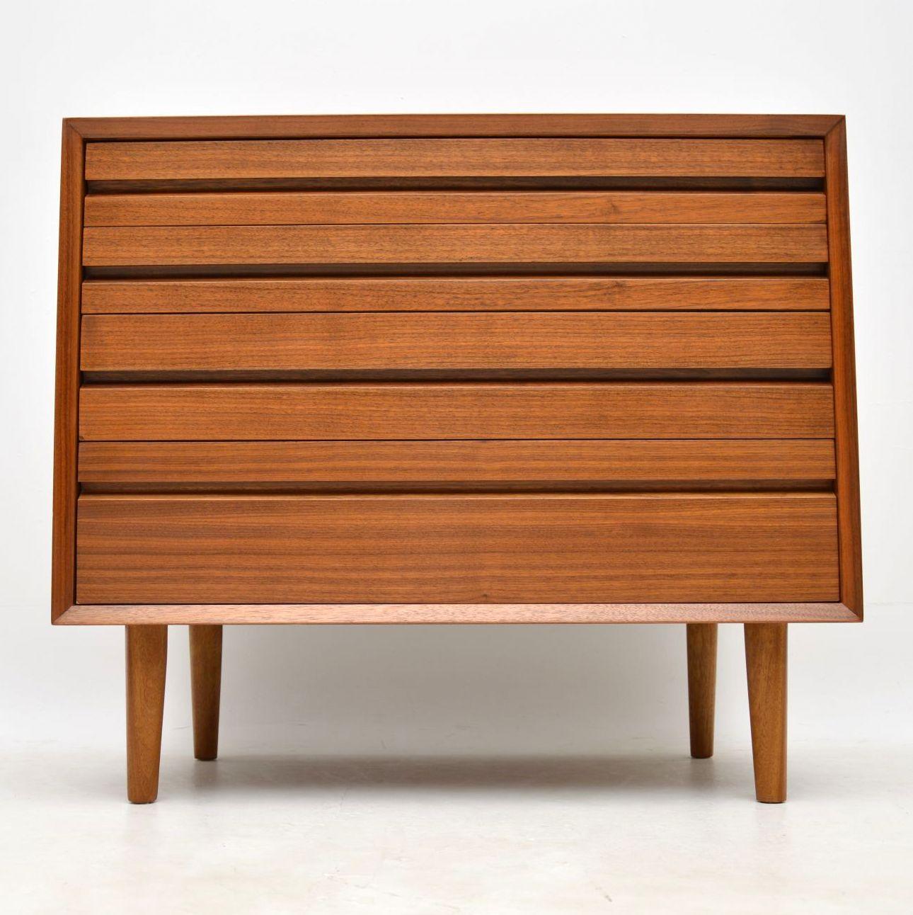 A stunning and rarely seen Danish walnut chest of drawers, designed by Poul Cadovius and made by his company Cado around the 1960’s. This is the first we’ve seen in walnut. The quality is superb, it has a fantastic minimal design. We have had this
