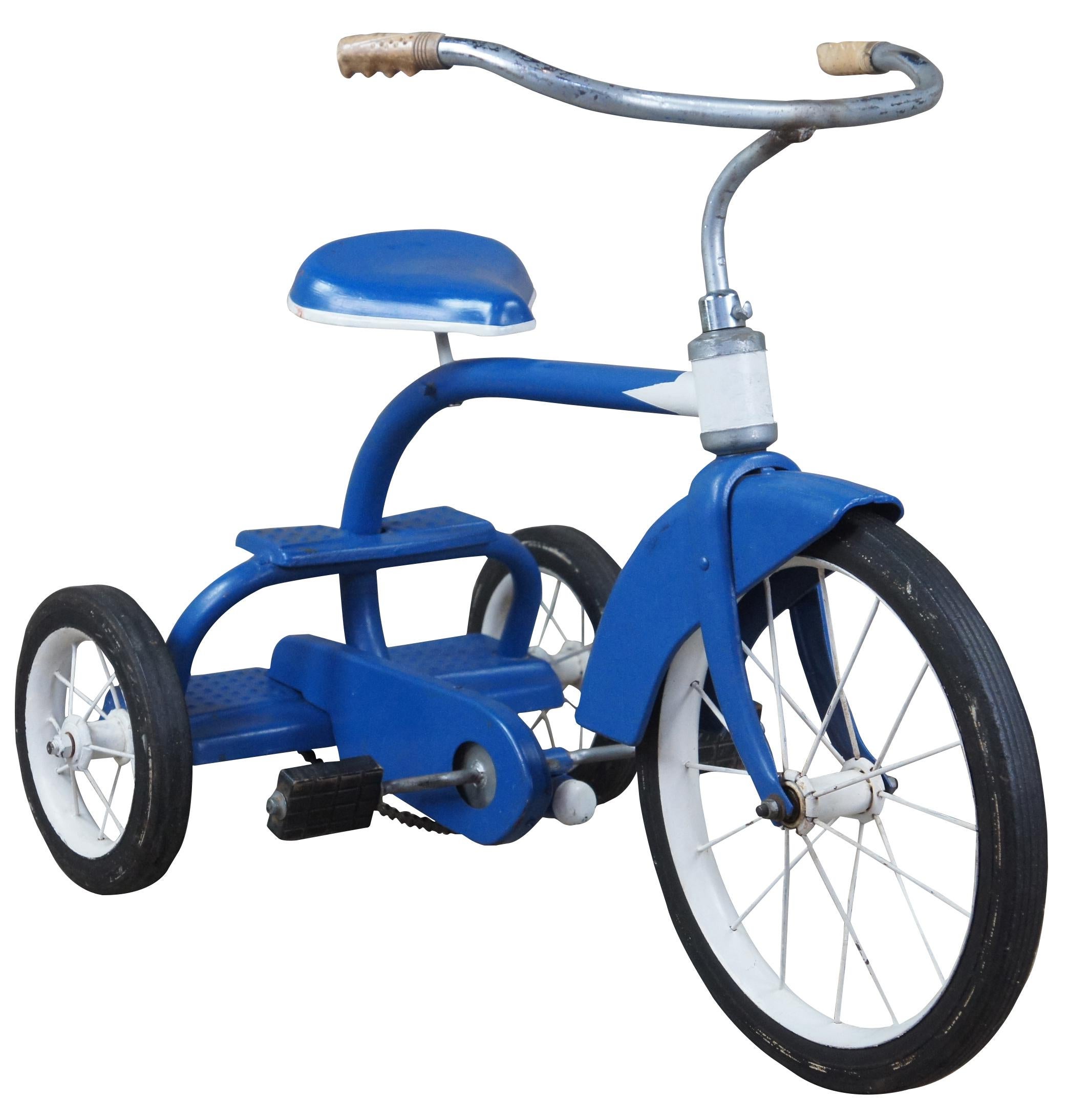 Vintage 1960s Western Flyer tricycle. Blue & White with black tires. Features a double step in the rear. Great for display and use!
   
