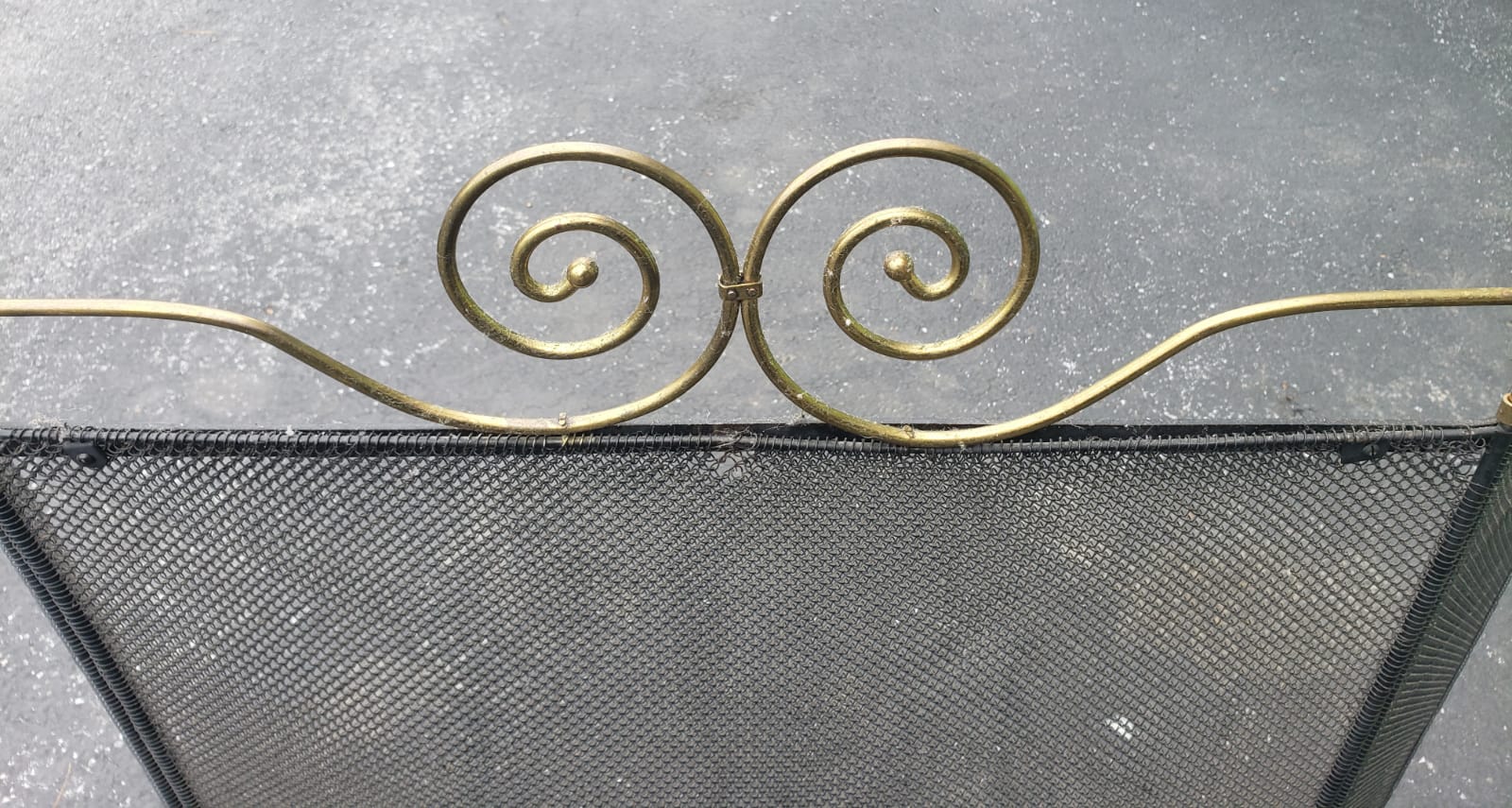 1960s Vintage Wire Mesh and Brass Ornate Fireplace screen. Black wire mesh. Solid brass ornate. 
Measures 40.5