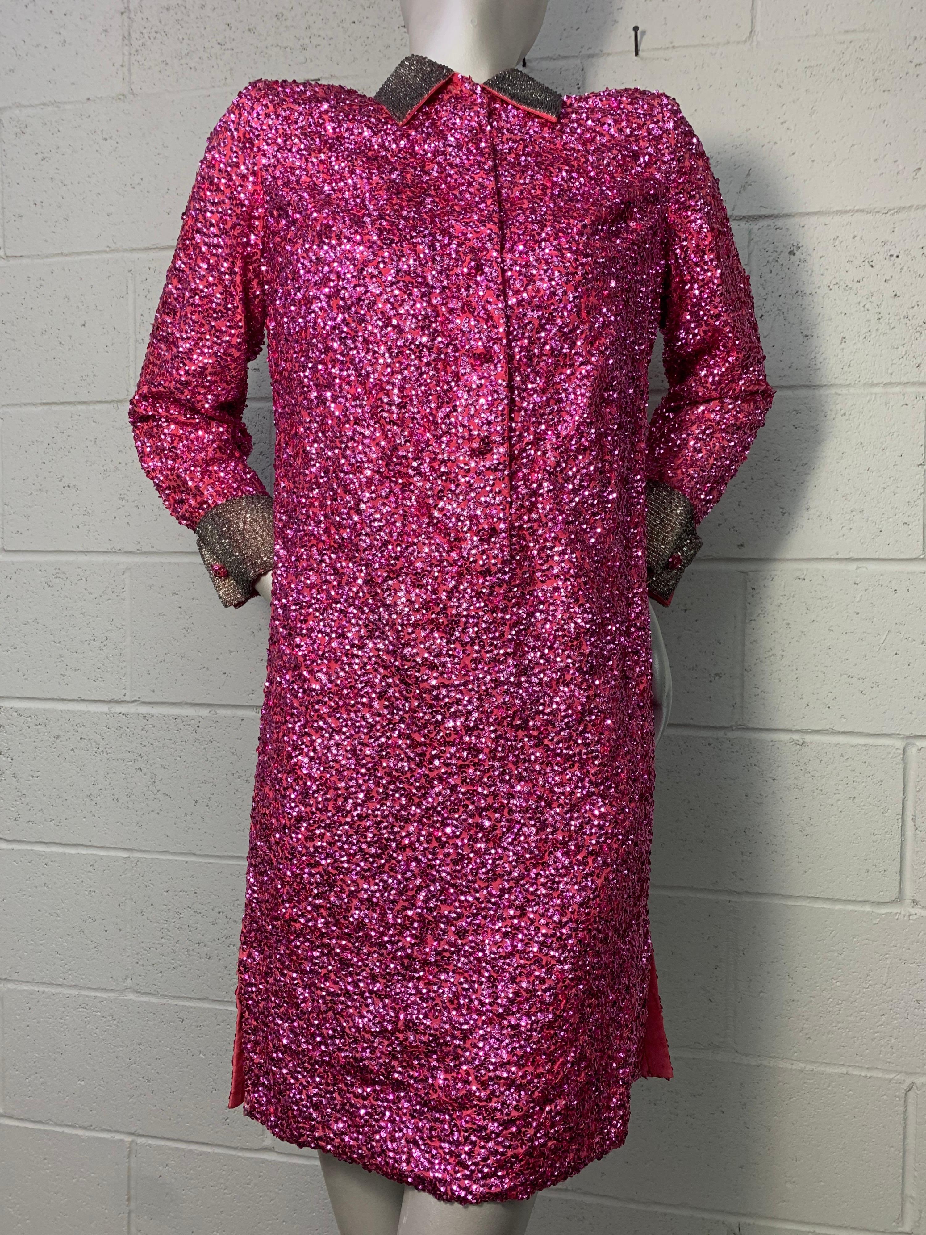 A stunning 1960s vivid fuchsia sequin encrusted rayon taffeta cocktail dress: Mod glamour at its best! Back overlaps with snap closures at back. Button cufflinks on beaded cuffs. Side vent. Made in Hong Kong by hand. Size 6. 