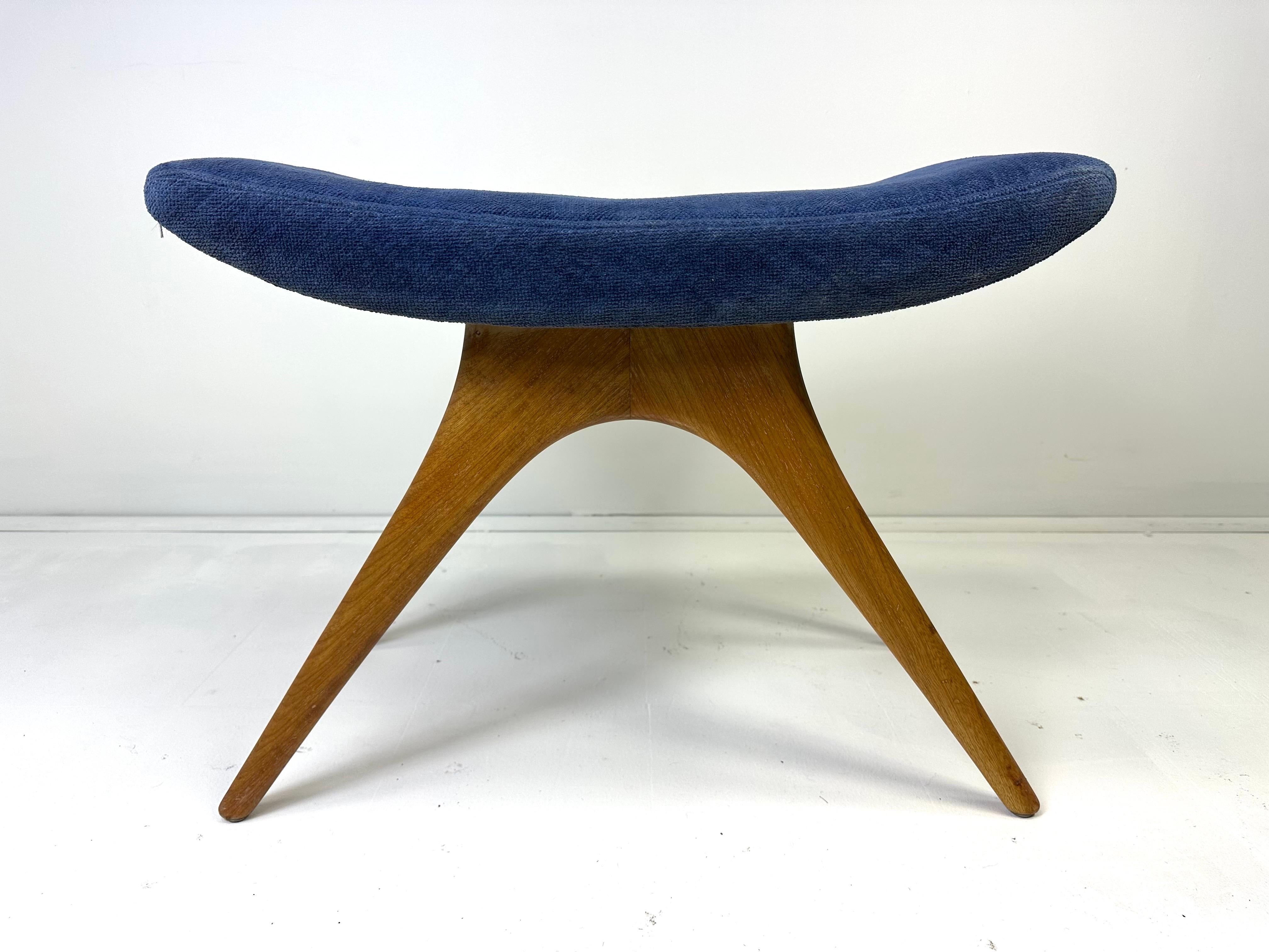 1960’s Vladimir Kagan stool. Sculpted Walnut base with upholstered seat. Kagan- Dreyfus. This piece was part of a collection of Kagan pieces from a friend of Vladimir Kagan. Unmarked.