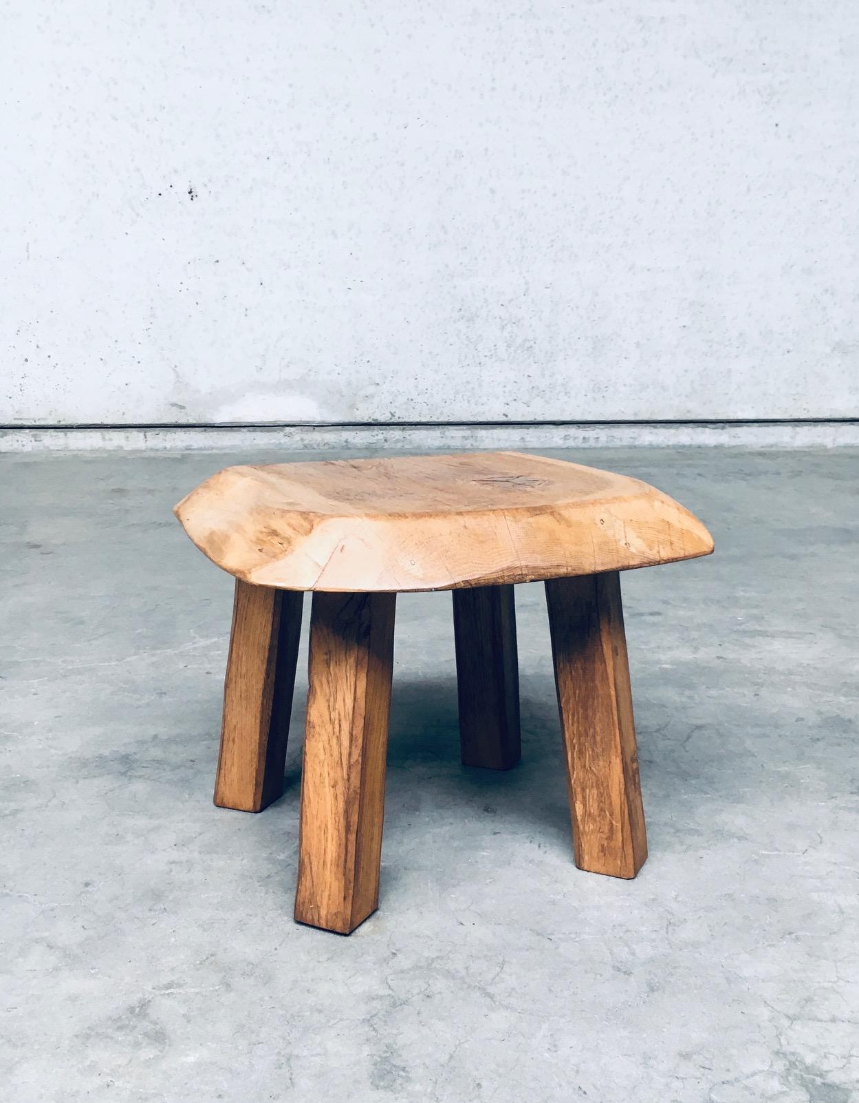 Vintage Wabi Sabi Style Brutalist in Design Oak Side Table. Made in the Netherlands, 1960's. Solid light colored oak constructed small side table. Carved thick oak slab as top with 4 chunky carved legs. This comes in very good, all original