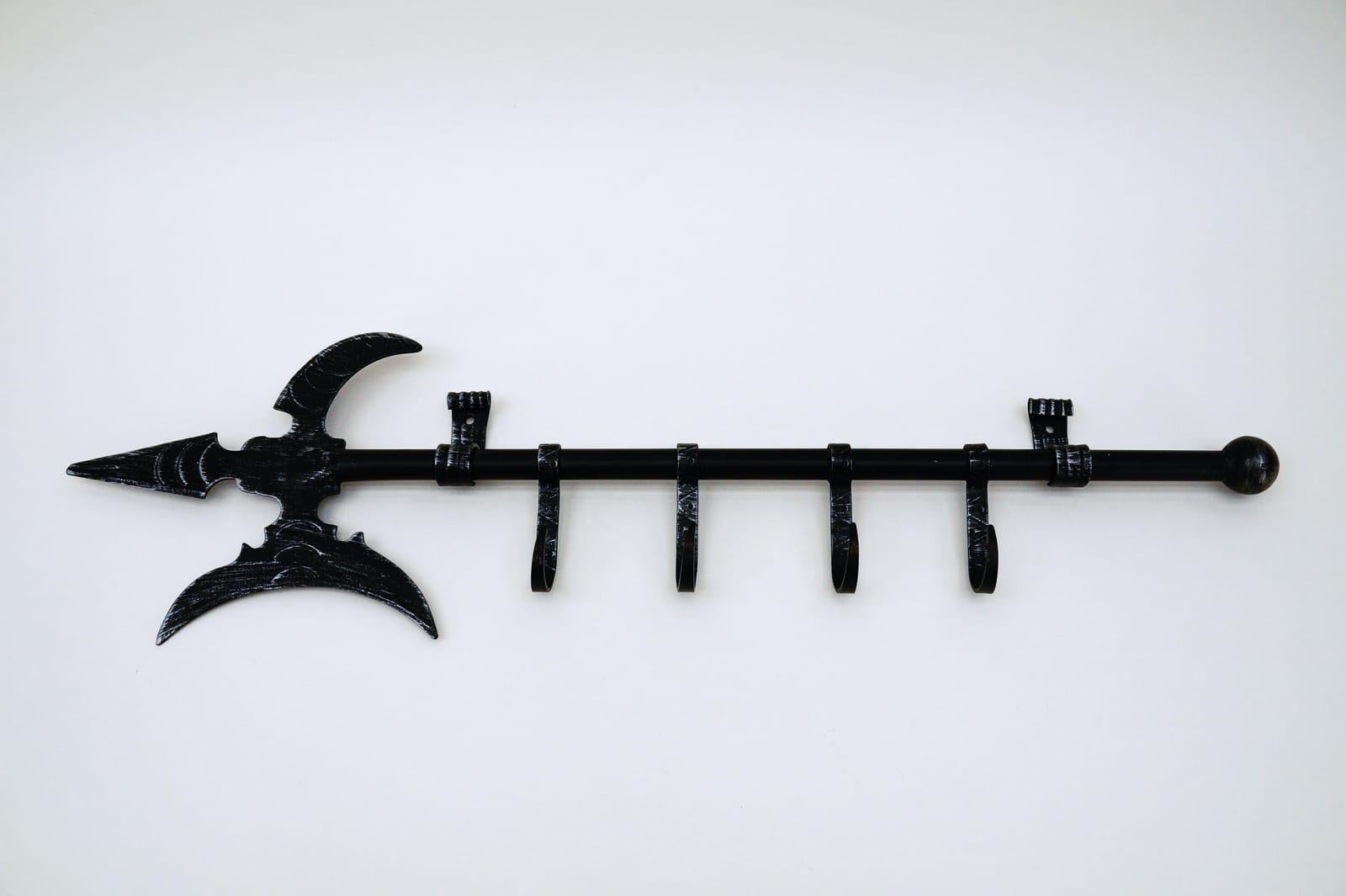 Hand forged vintage wall coat rack in very good condition.