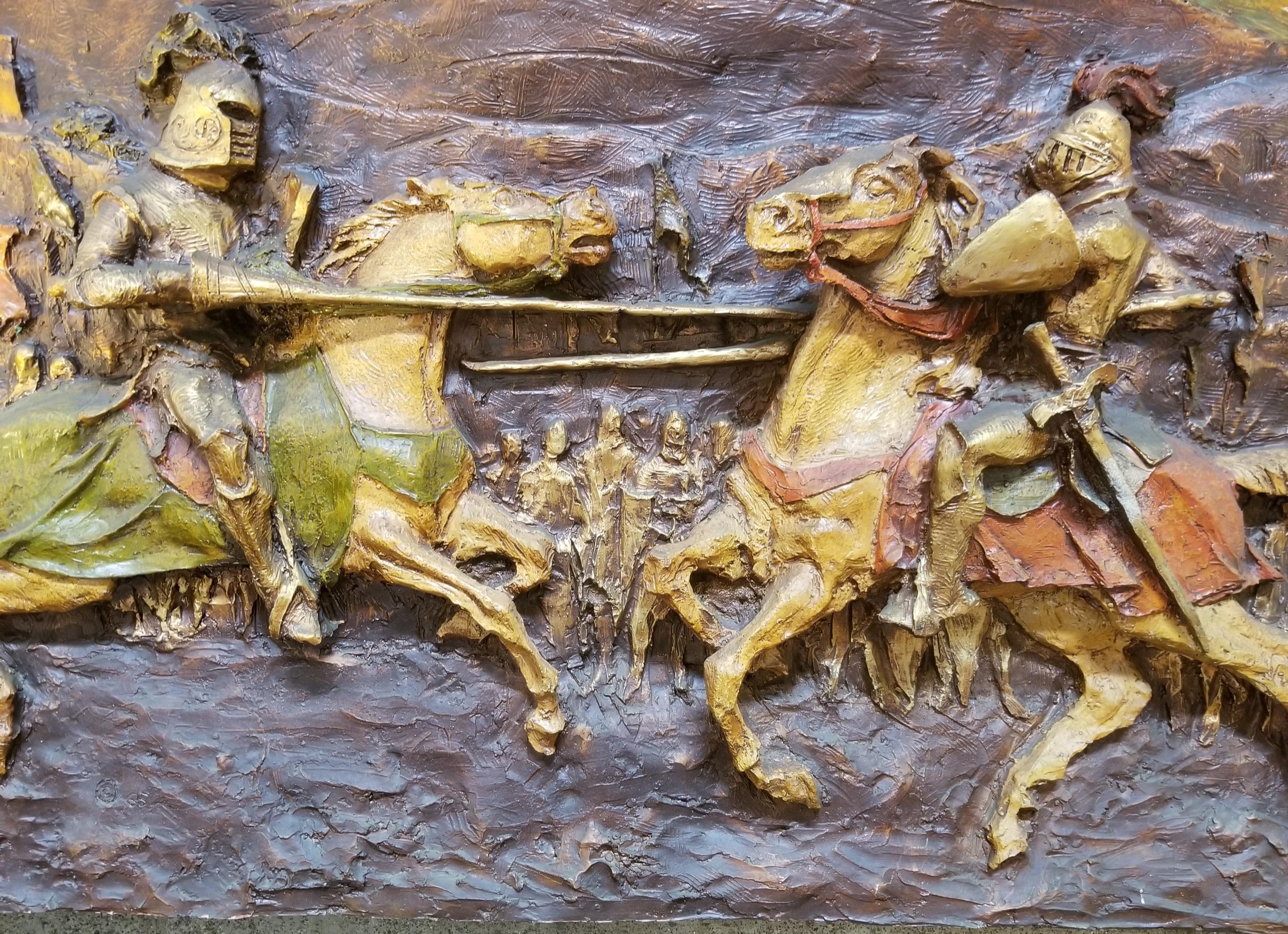 High-relief, 3 dimensional Mid-Century Modern wall sculpture of knights jousting. Made of formed and molded fiberglass. Figures and horses in high relief. Copyright dated 1965, relief signed by artist J. Segura. Impressive, unique wall mounted