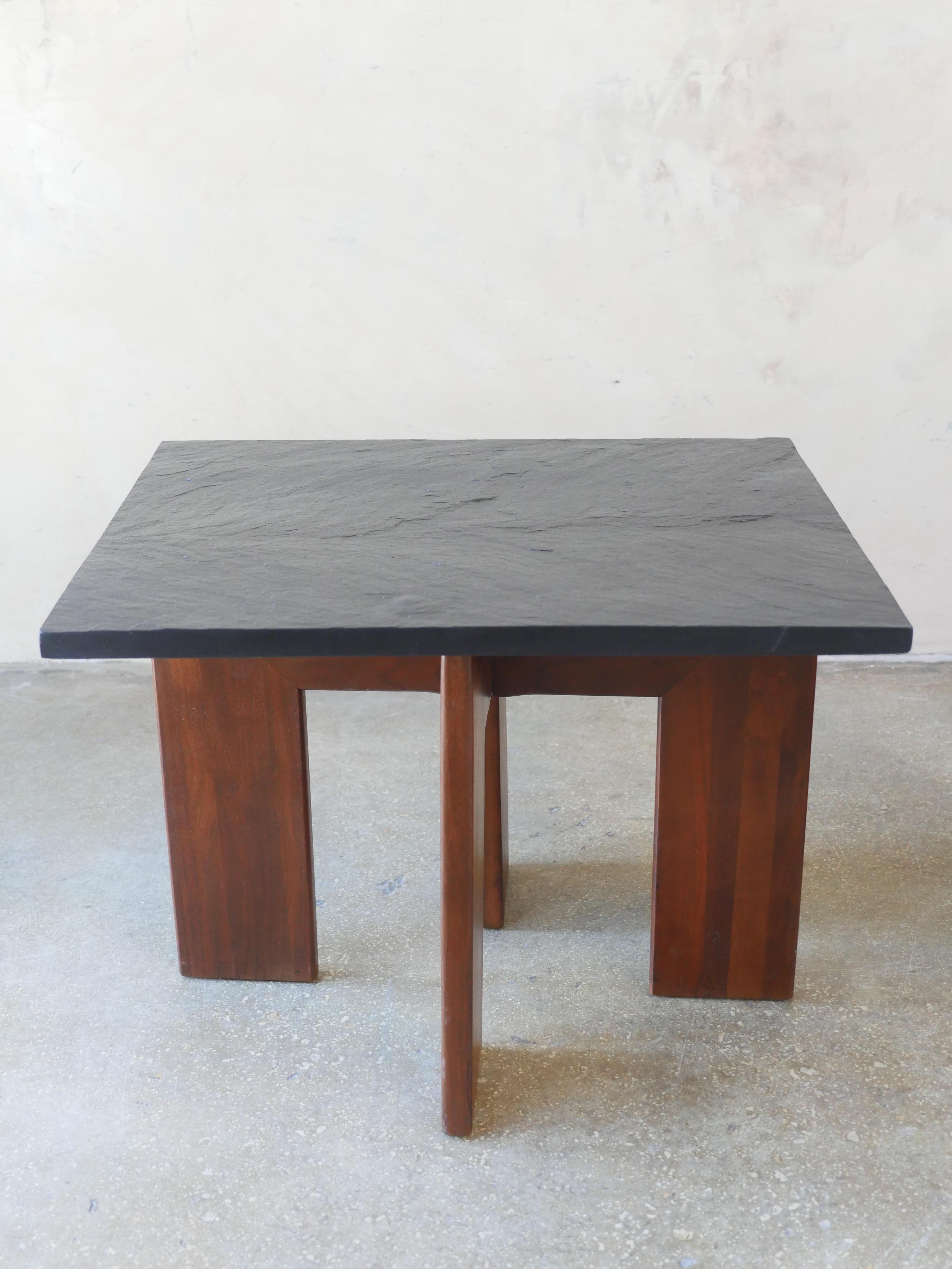 1960s Pair of sleek, walnut and slate, Mid-Century Modern side-tables designed by Adrian Pearsall. These signature side-tables, add a nice touch of vintage elegance to any space.