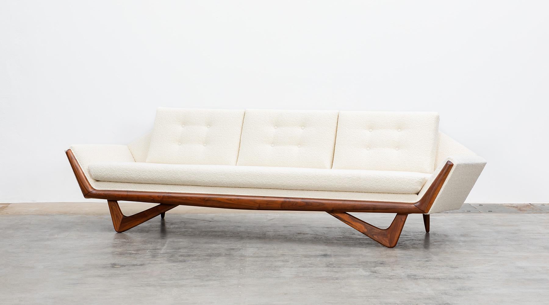 Sofa by Adrian Pearsall, walnut base, new upholstery (fabric by Dedar), USA, 1965.

Stunning Sofa designed by American Adrian Pearsall. The sofa comes new upholstered in off white high-quality Dedar fabric. The complex construction of the legs is