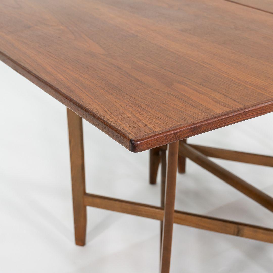 Mesa de comedor con patas extensibles de nogal de los años 60, de Bendt Winge Acero en venta