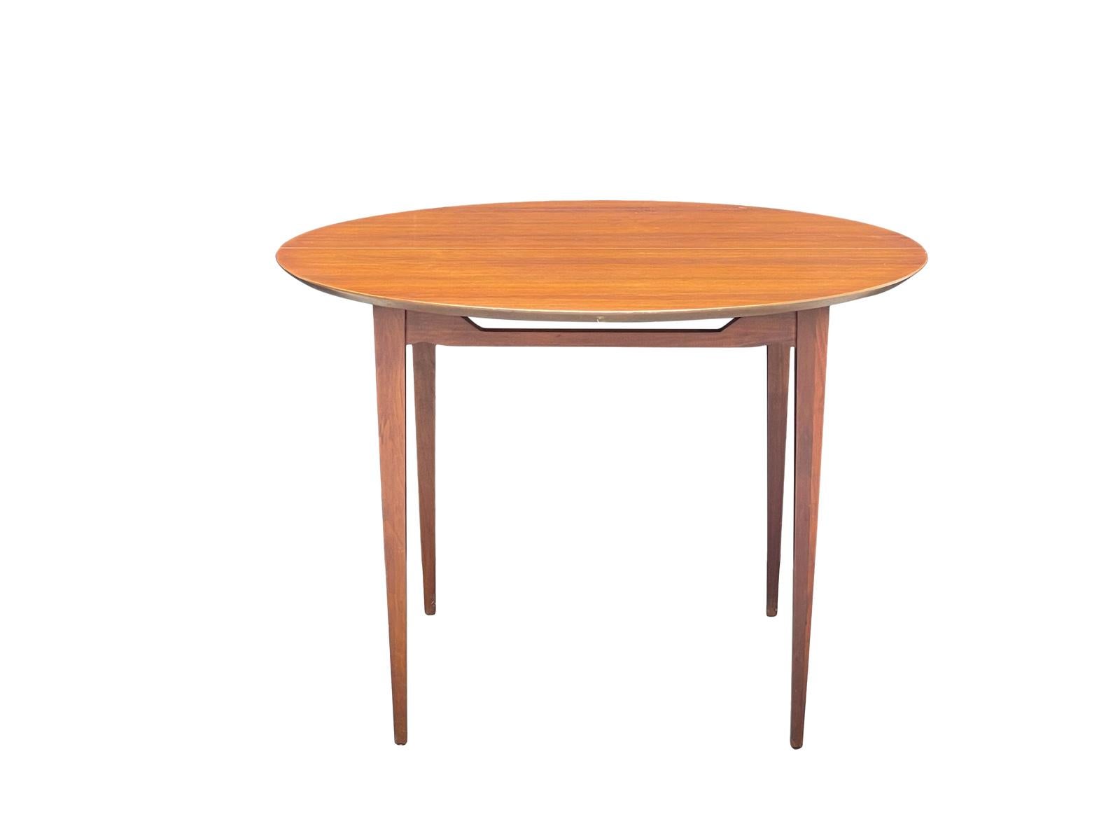 American 1960s Walnut Round Tapered Extending Dining Table