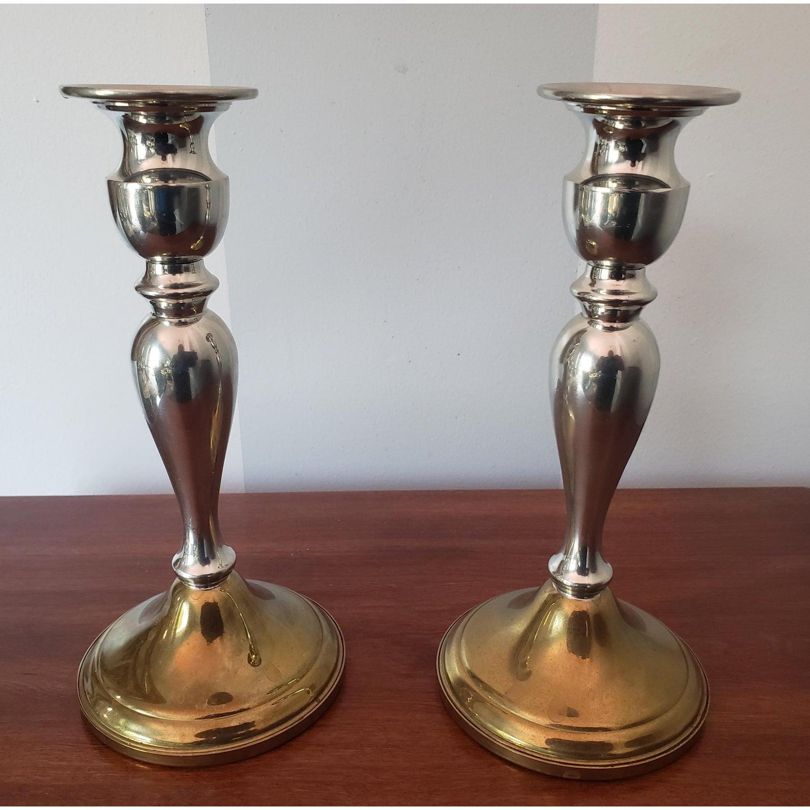 Pair of 1960s weighted web pewter candle holders. 
Dual silver and brass tone. 
Very Good condition. Measure 4