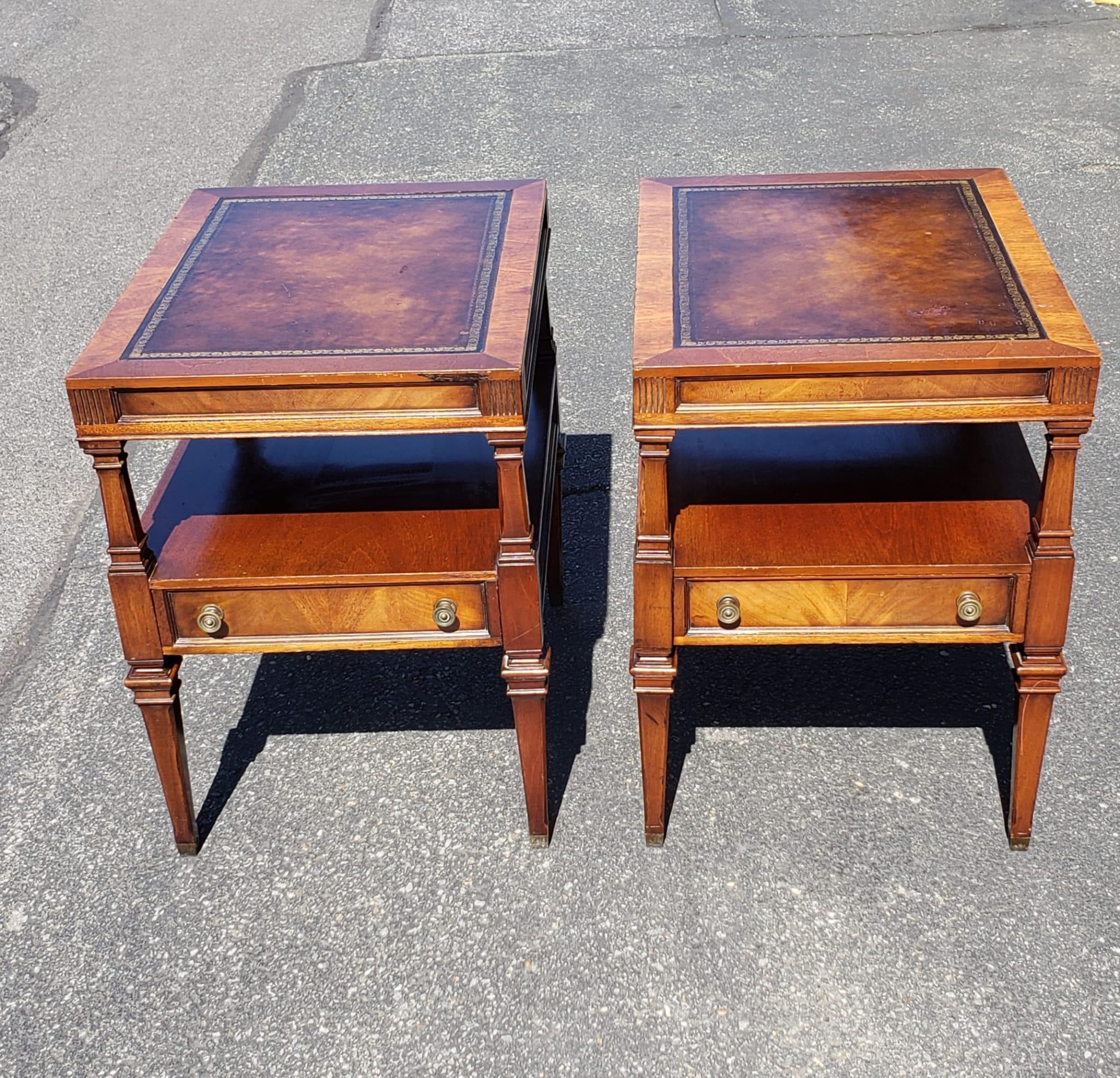 Mid 20th century Weiman Furniture Heirloom two tier Mahogany and Tooled top o e drawer sides table pair. Very good vintage condition.