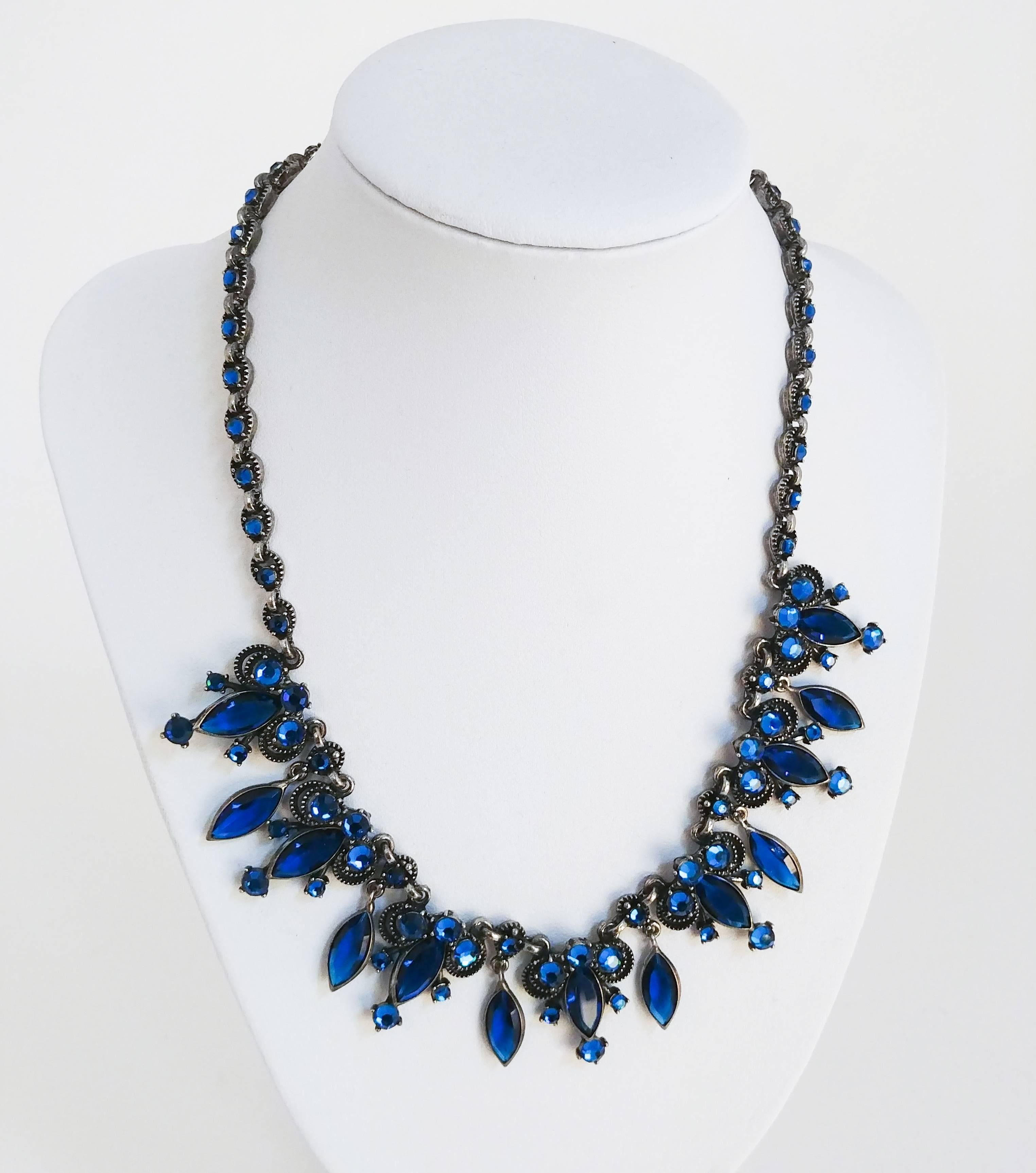 1960s Weiss Blue Rhinestone Set. Four piece set consists of necklace, clip-on earrings, bracelet, and brooch. 