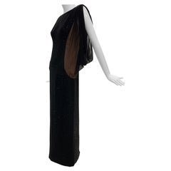 Abito Werle anni '60 in chiffon di seta glamour e glitterato nero con maniche drammatiche