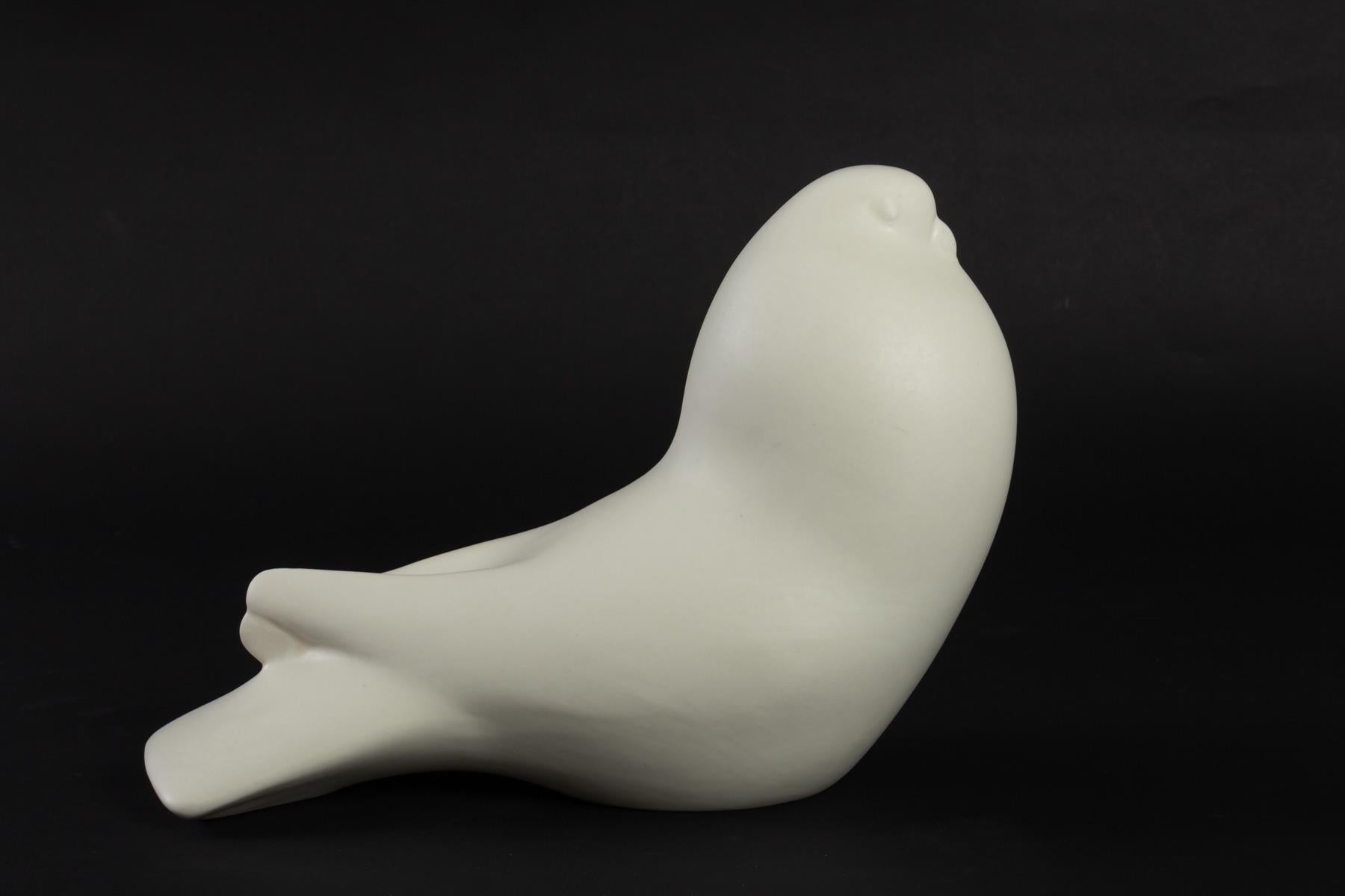 Charming white ceramic made by Zaccagnini, Italy in the 1960s.
Signature located below the bird.
     