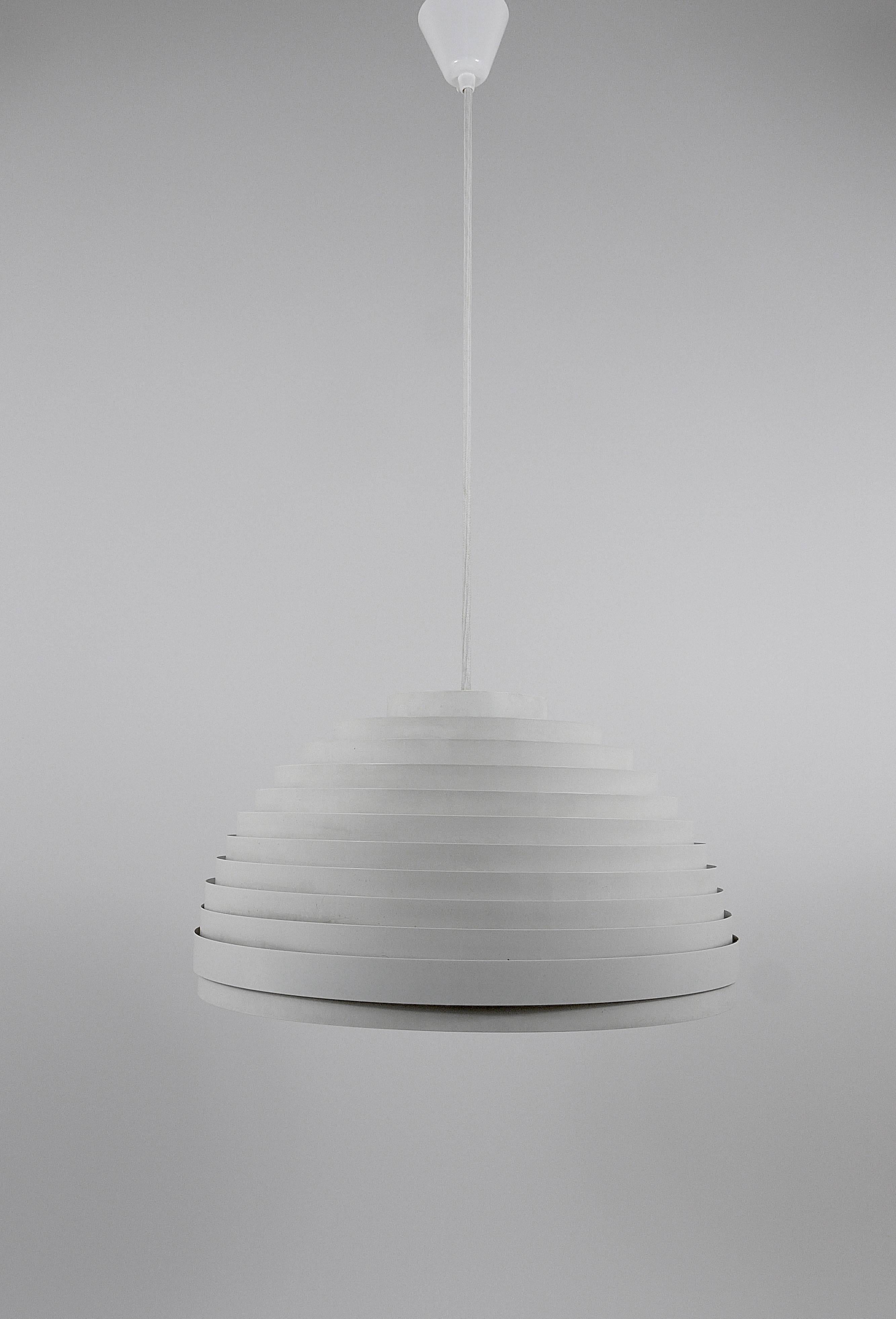 A beautiful white hemispherical Space Age lamella pendant light from the 1960s, model 