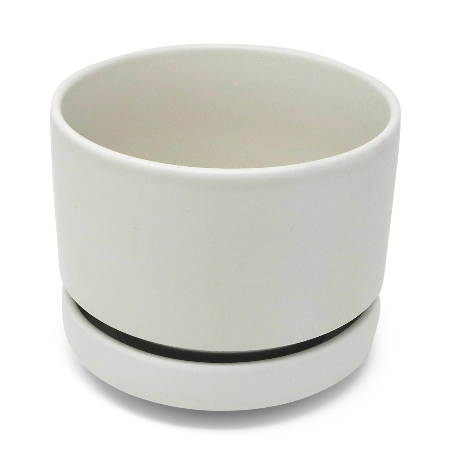 An iconic Scandinavian Modern ceramic planter designed by Richard Lindh for Arabia Finland in the early-1960s. This design was in production from 1964 to 1985 but has since been discontinued. Perfect for any mid-century modern inspired home, office,