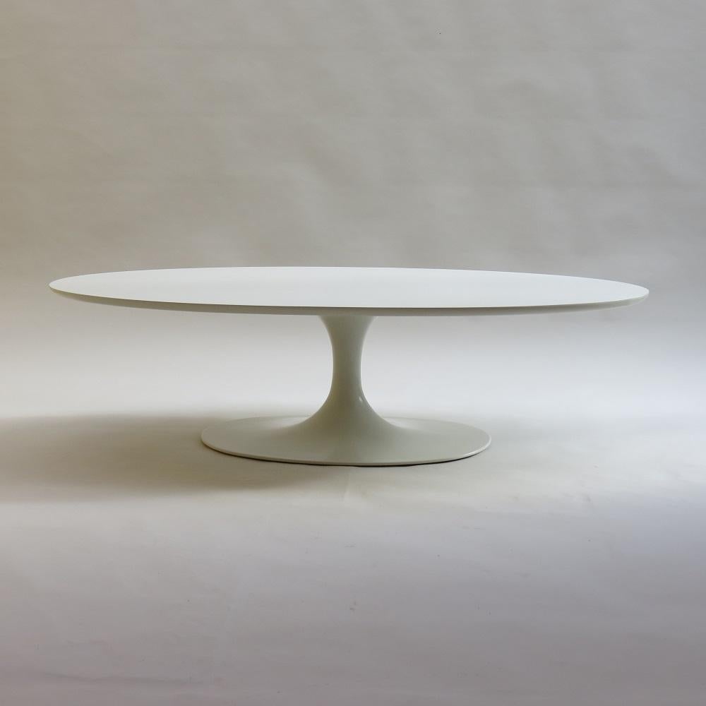 White Oval Tulip coffee table, manufactured by Arkana, Bath UK and designed by Maurice Burke in the 1960s. This table is one of the rarer  pieces of Arkana furniture, the quality is exceptional.

Painted cast aluminium base and formica top.

In good