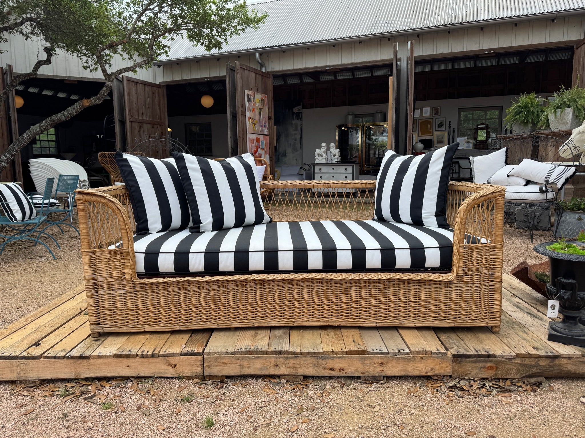 Beautiful Wicker Rattan Day bed with fresh upholstery and new foam.  This piece is wonderful indoor or outside (best on covered patio) and the fabric is Sunbrella for outdoor performance use.  The pillows are included.  The frame looks like a twin