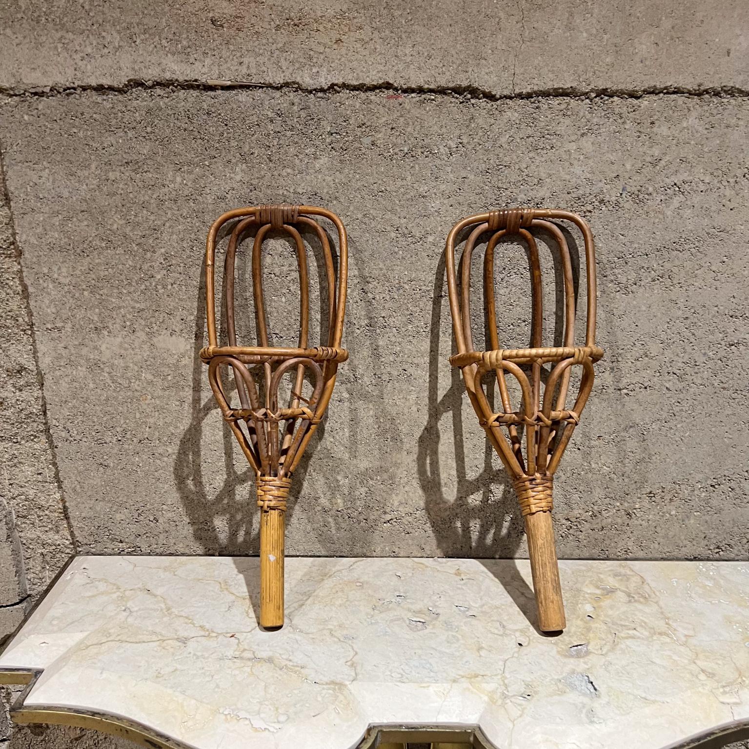 AMBIANIC presents
Vintage Wrapped Cane Wicker Rattan Wall Holder Pair
Jai Alai Toy Racket Scoop Ball Toss
Useful for wall decor
Style Franco Albini
15.75 h x 5.5 diameter
Preowned vintage review images