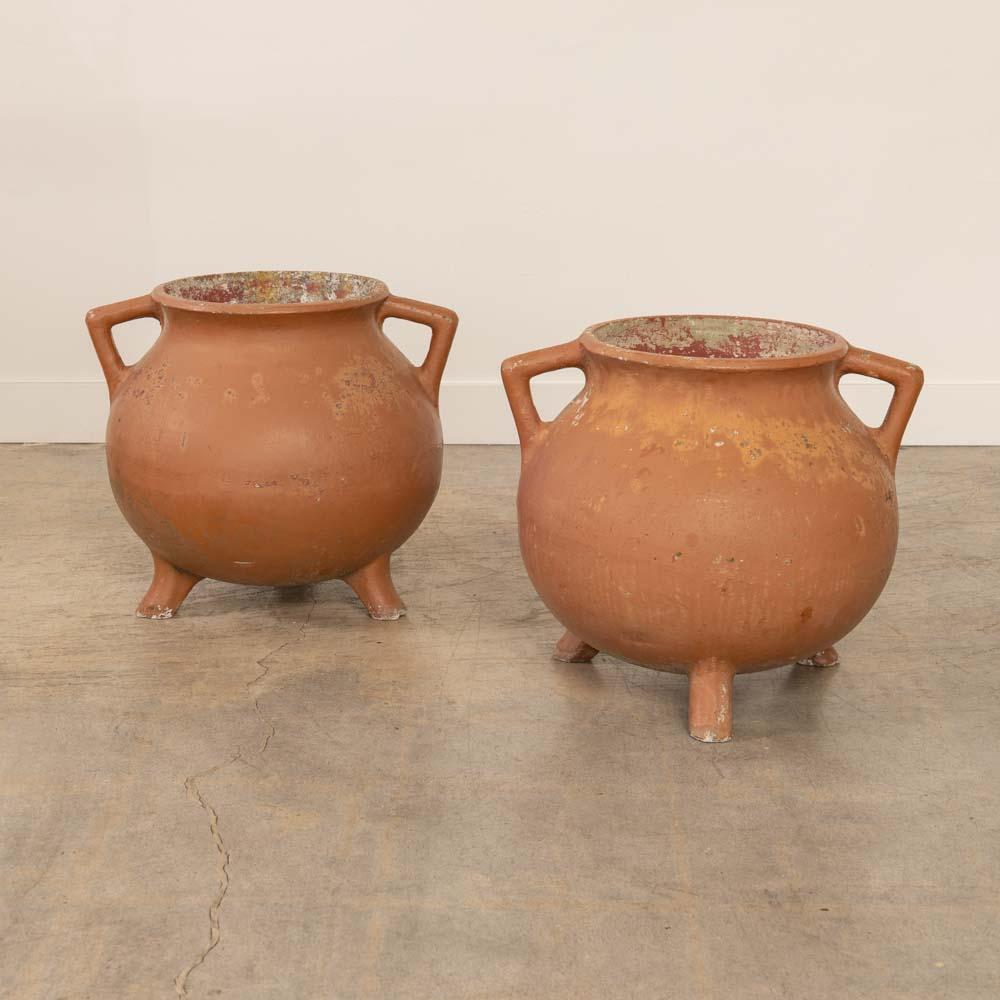 Incredible cast concrete cauldron planter made in Switzerland, 1960's. Vintage piece with great modern form by Willy Guhl, perfect for indoor or outdoor use. Wonderful age and patina throughout. Sold individually. 