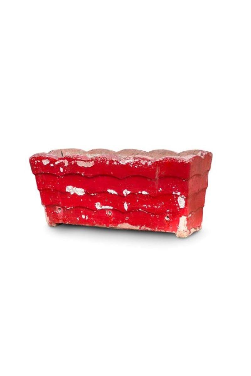 The willy guhl vintage red planter from the 1960s, crafted in switzerland. Its vibrant red hue and exquisite patina make it a sought-after collector's piece.  We have 4 available with different variations of red and white.

Measurements: 9.5” w x