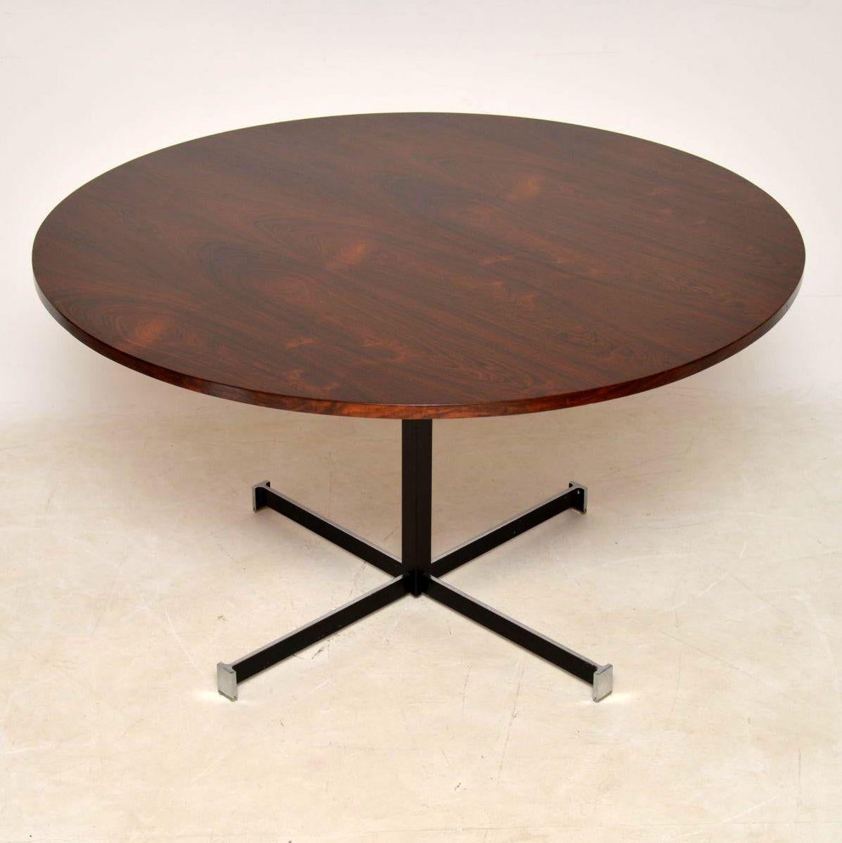 A beautiful vintage dining table with a large circular top, and chromed steel base. This is a great size and can seat up to six, as the base is a central column, there are no obstructions for chairs. The top has stunning grain patterns and a