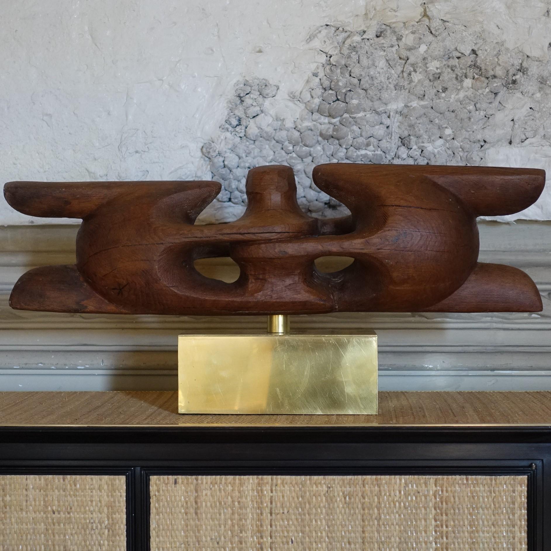 One of a kind wood sculpture maquette realized by the artist Dragoljub Milosevic (1939-2019), free form abstract movement, hand carved with beautiful vintage patina, natural brass base.

Measures: cm 30 x 25 x H.47.
