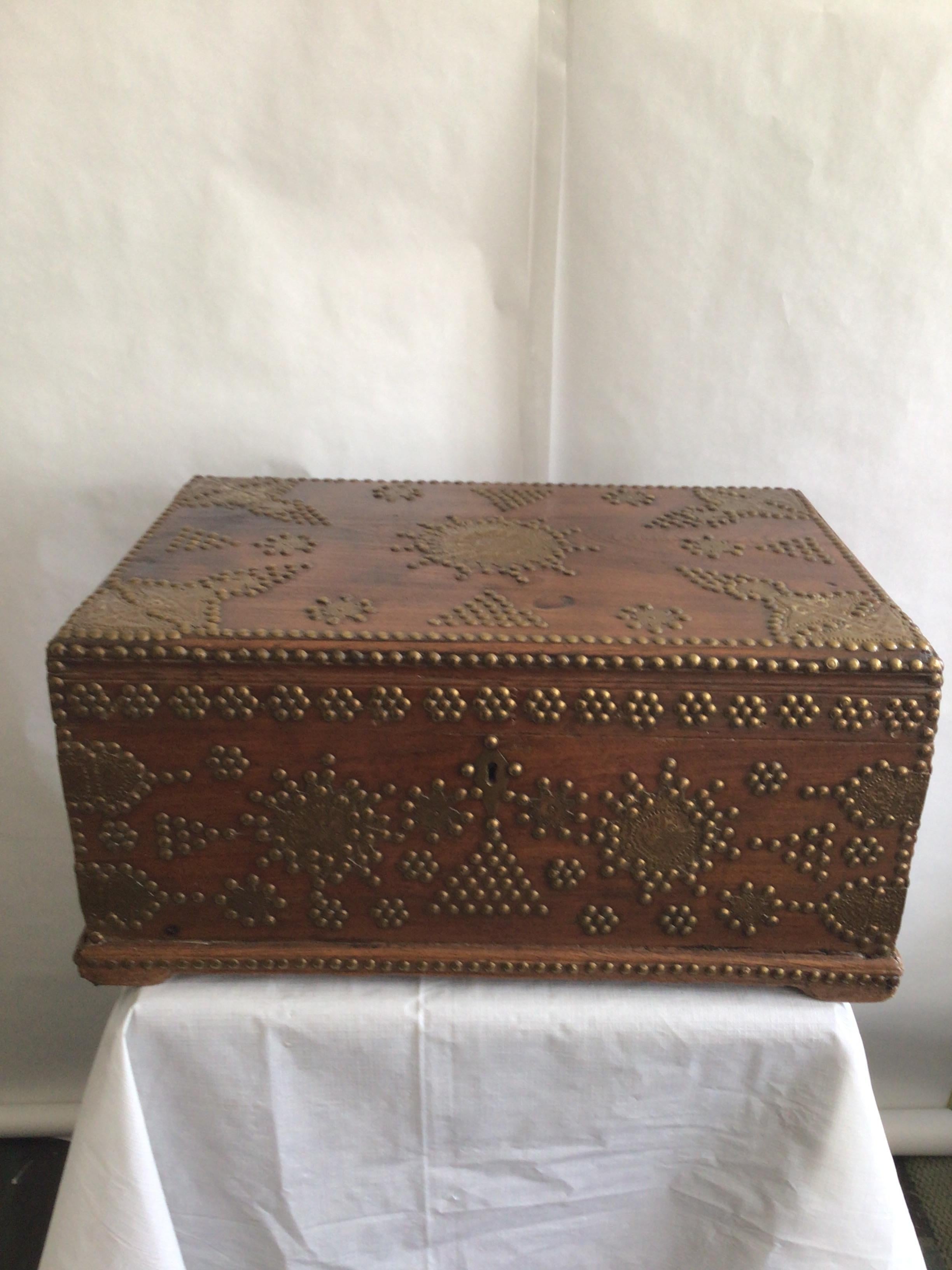 1960s Wood Small Trunk Ornately Embellished With Brass Studs
Removable interior trays 
Keyhole without a key