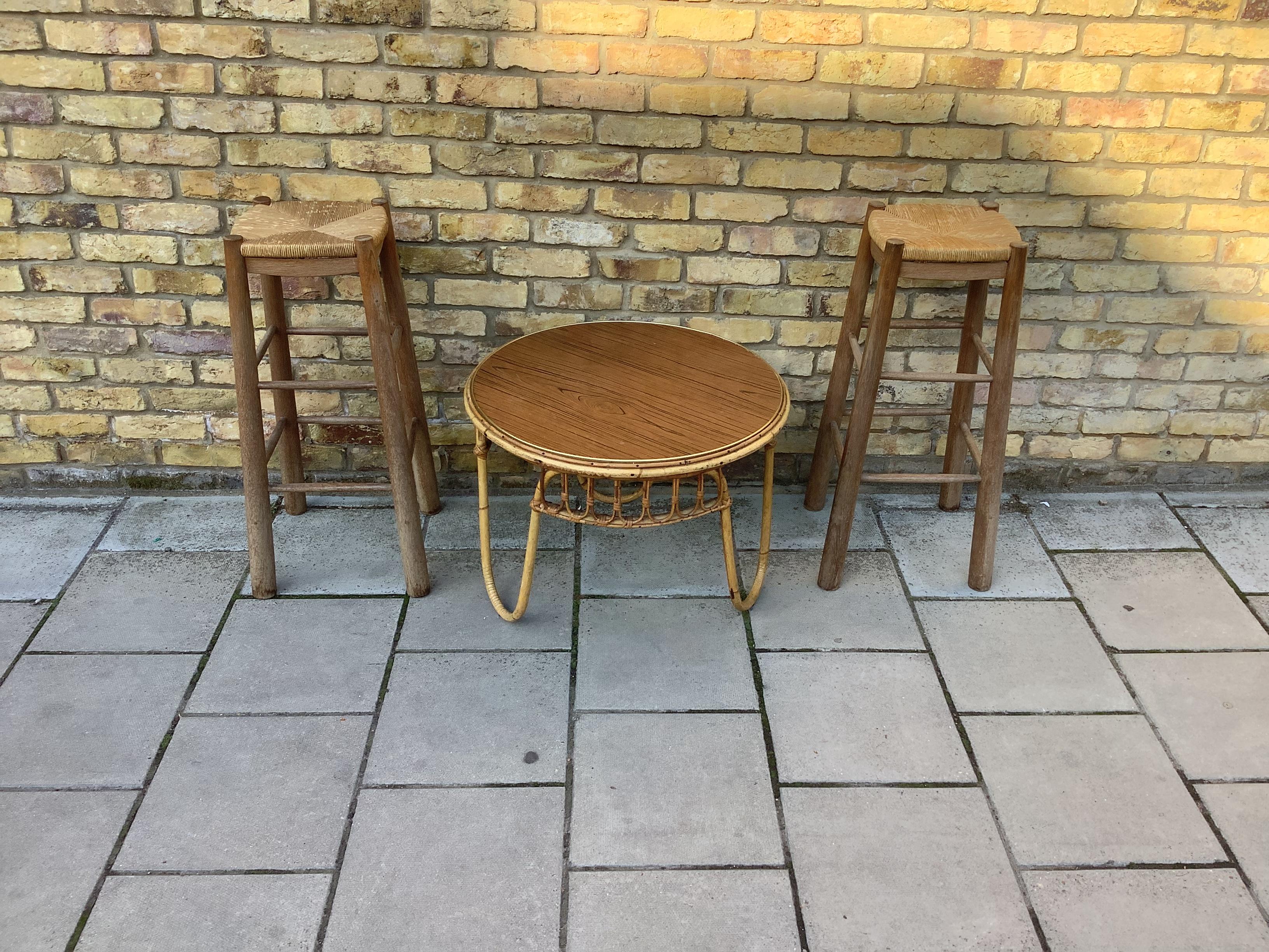 A pair of French stools with beautiful natural woven seating.

