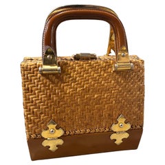 1960s Woven Wicker Leather and Brass Top Handle Bag by Rodo
