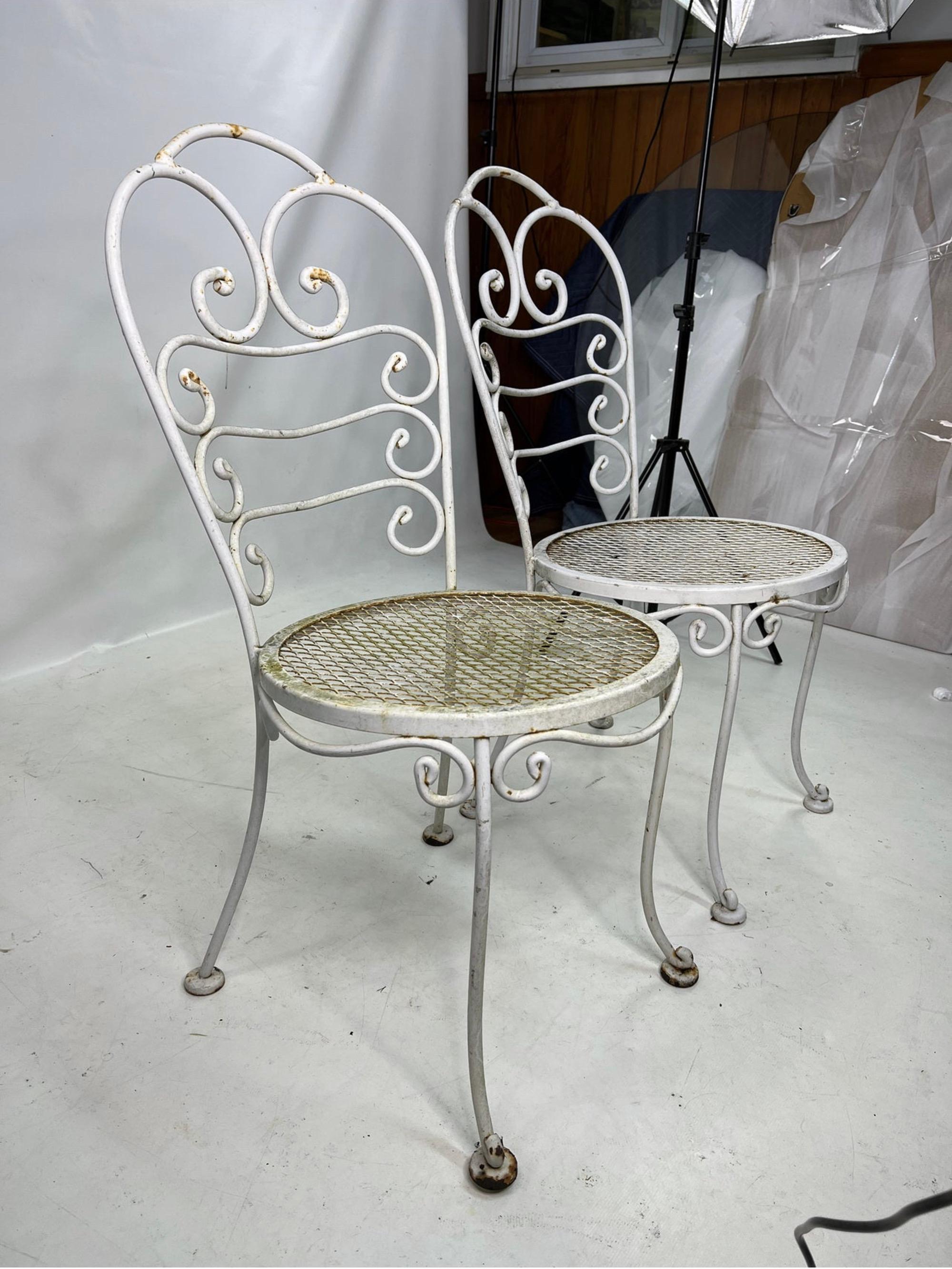 1960s Wrought iron cafe chairs - a pair.