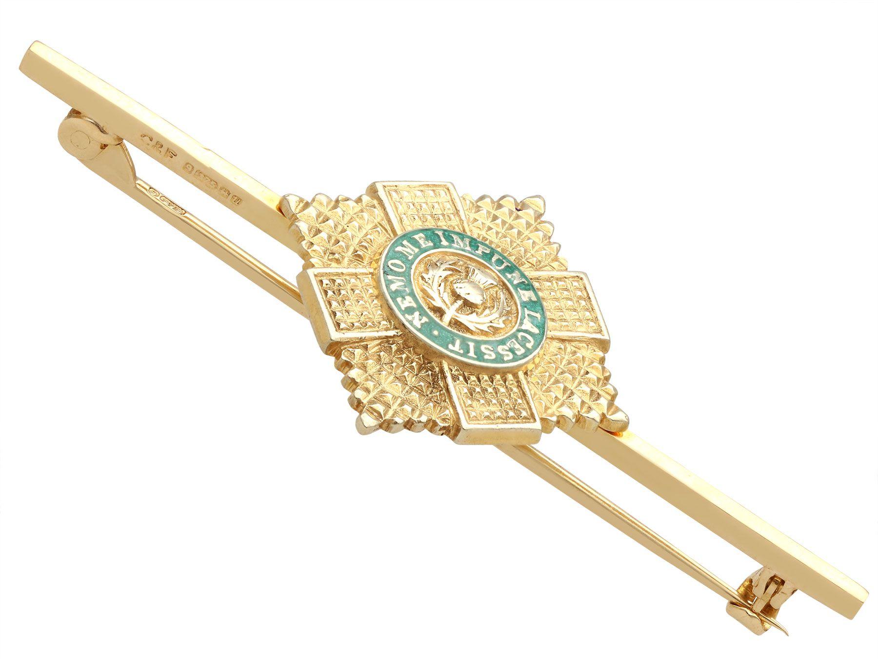 A fine and impressive vintage Scots Guard Brooch in 9 karat yellow gold and enamel; part of our diverse collection of military related items.

This impressive vintage Scots Guards regimental brooch has been crafted in 9k yellow gold.

The bar brooch