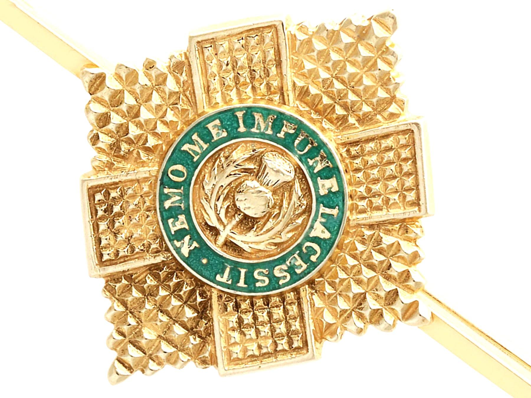 A fine and impressive vintage Scots Guard Brooch in 9 karat yellow gold and enamel; part of our diverse collection of military related items.

This impressive vintage Scots Guards regimental brooch has been crafted in 9k yellow gold.

The bar brooch
