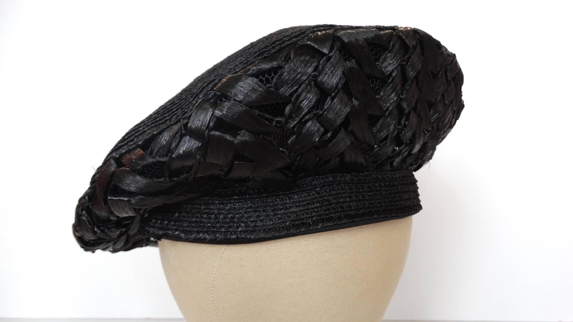 The dreamiest 1960s raffia beret designed by Yves Saint Laurent for Christian Dior! Made of a tightly woven black glossy raffia along the top,  with large, loosely woven brim. Pairs perfectly with all your Parisian inspired looks! Fully lined cloth
