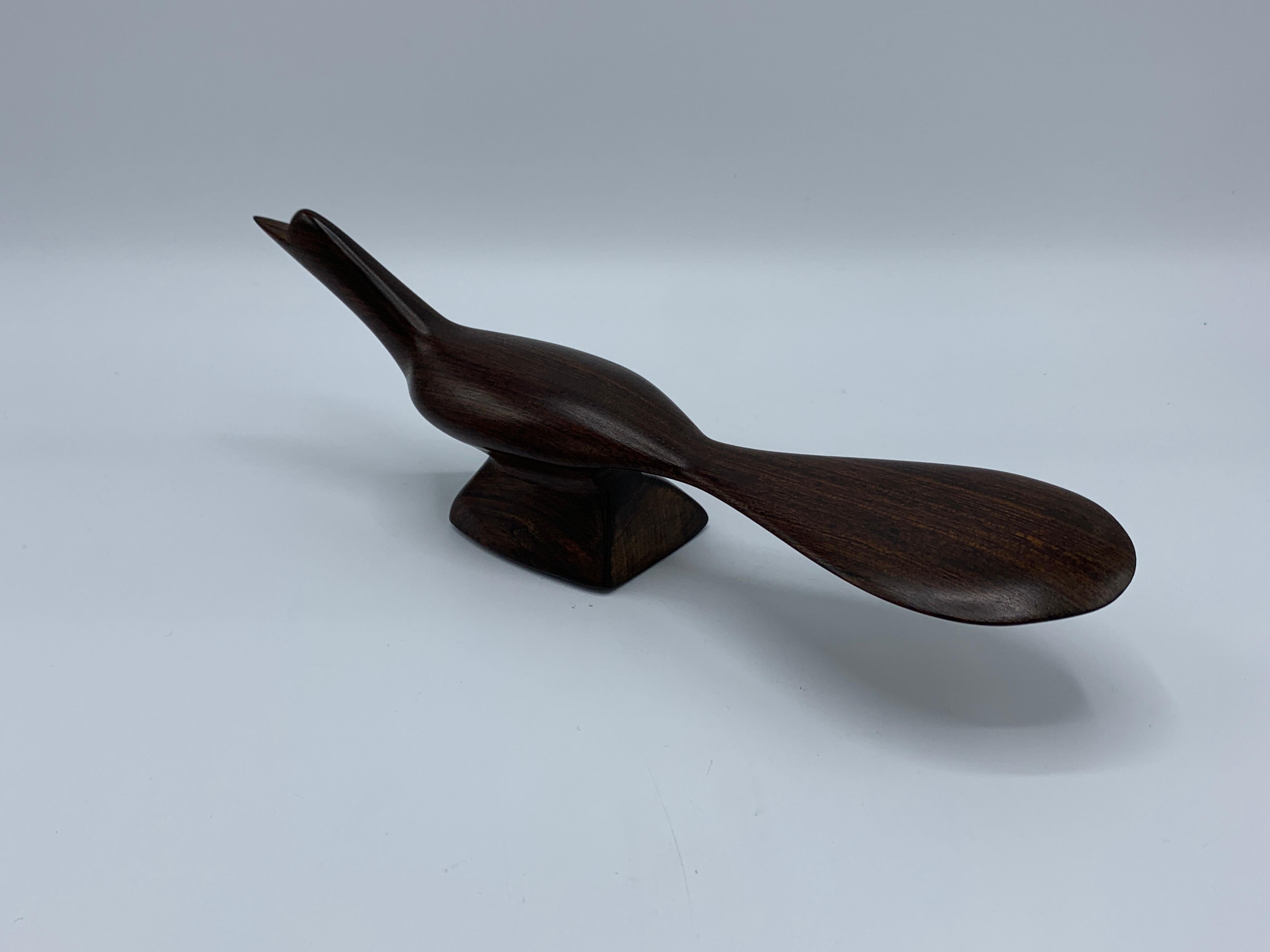 Offered is a gorgeous, hand carved, 1960s dark zebra-wood roadrunner bird sculpture. We have a zebra wood pelican available as well.